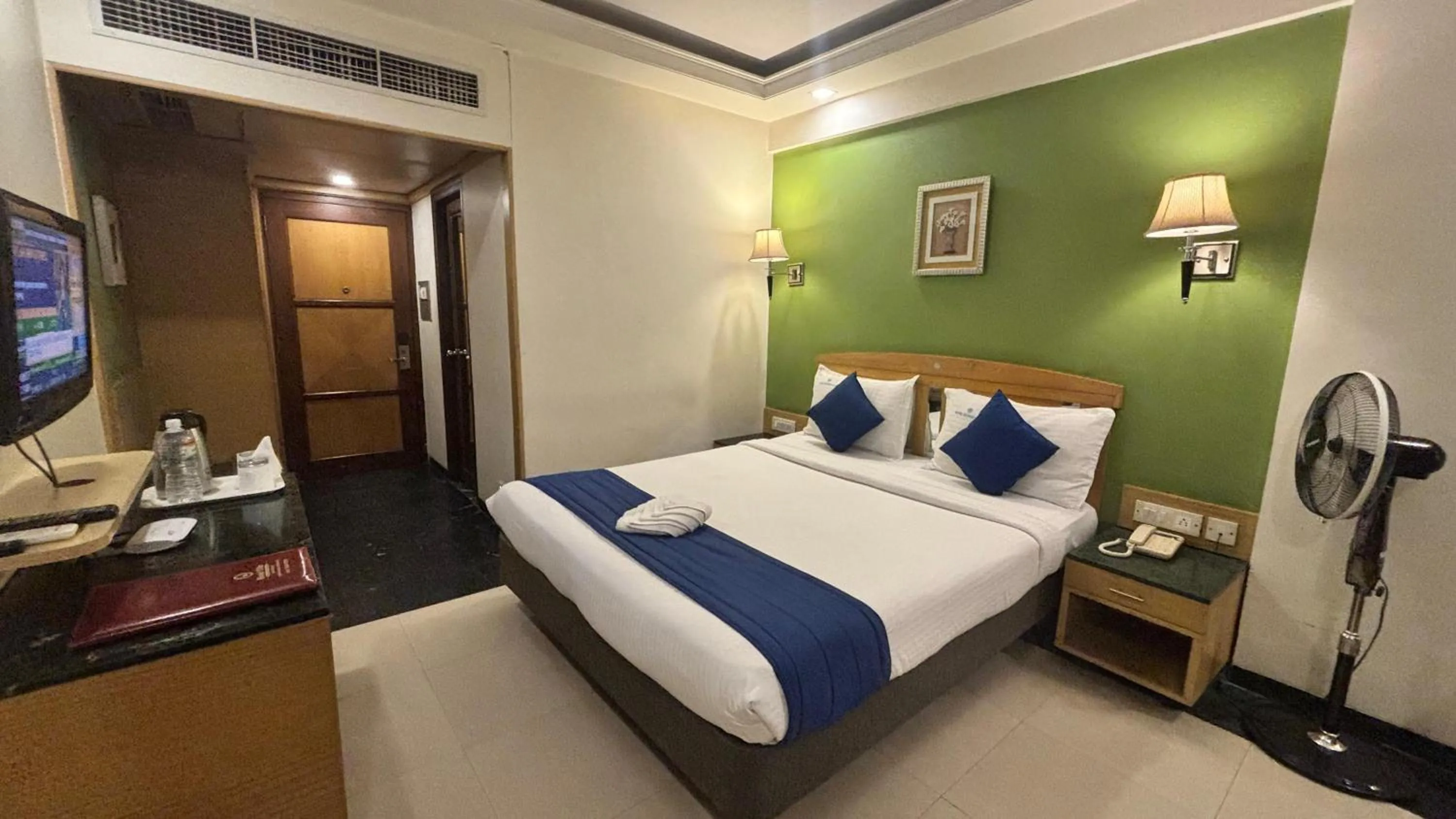 Bed in Hotel Dr Rajkumar International