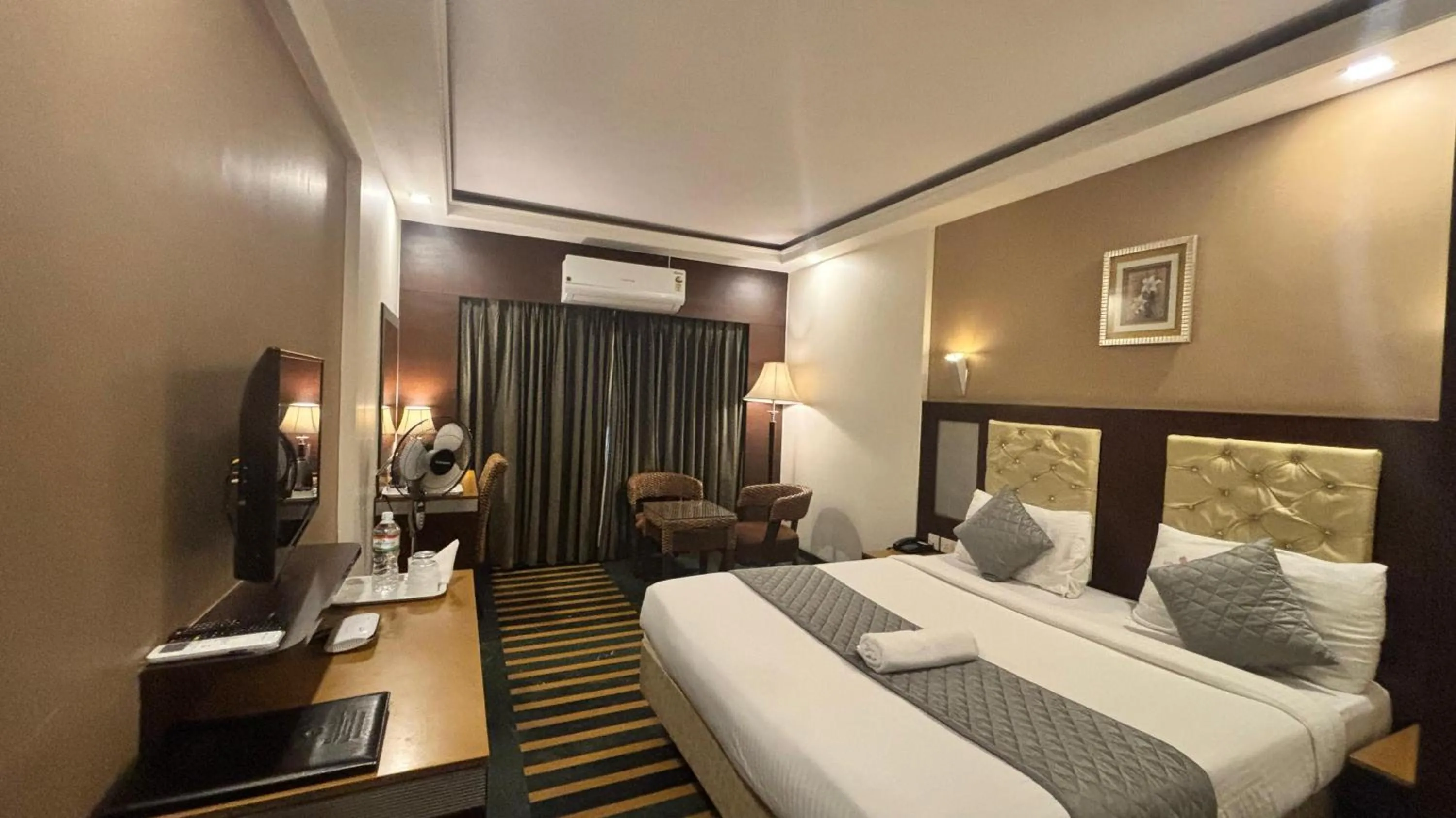 Bed in Hotel Dr Rajkumar International