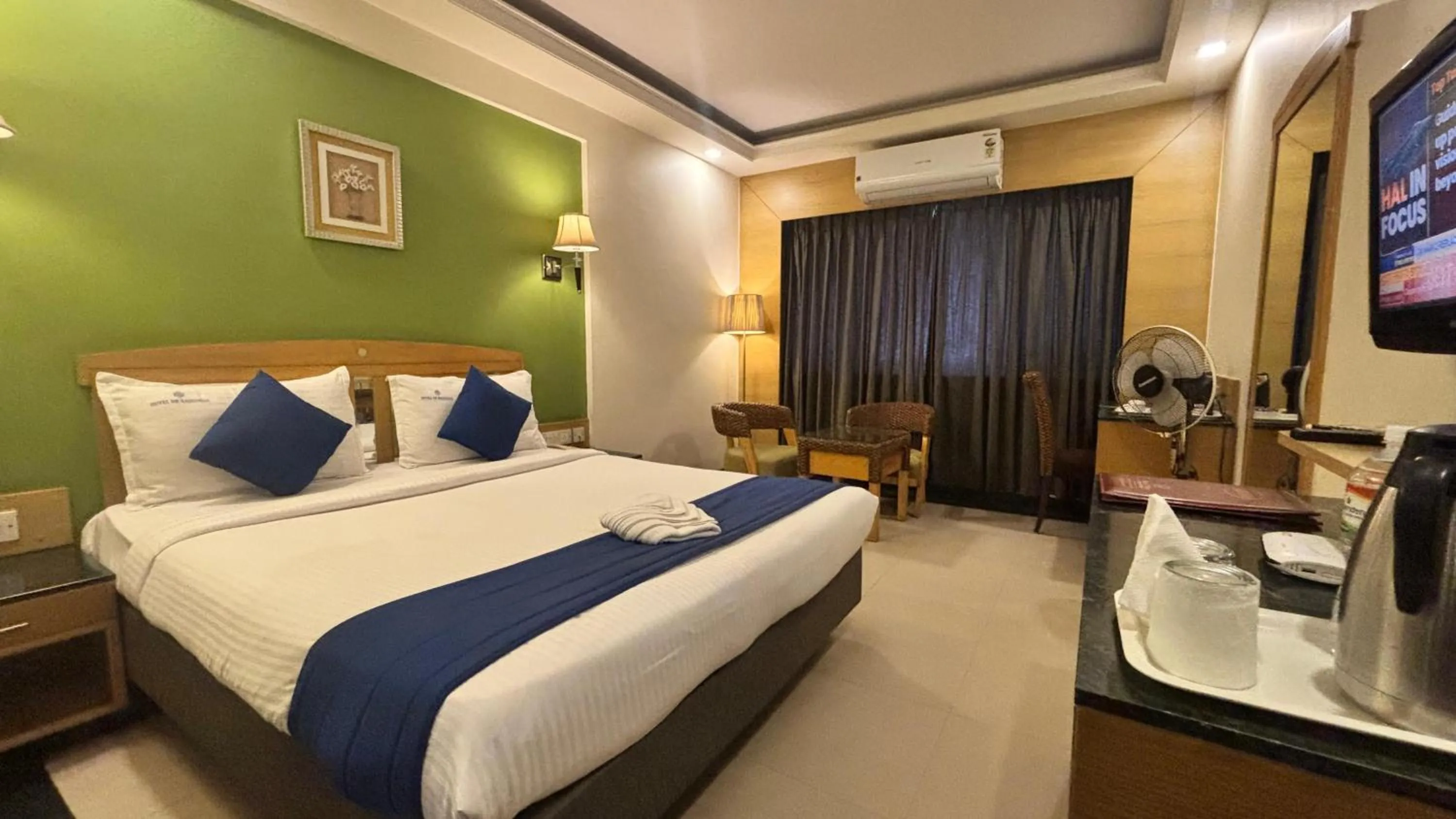 Bed in Hotel Dr Rajkumar International