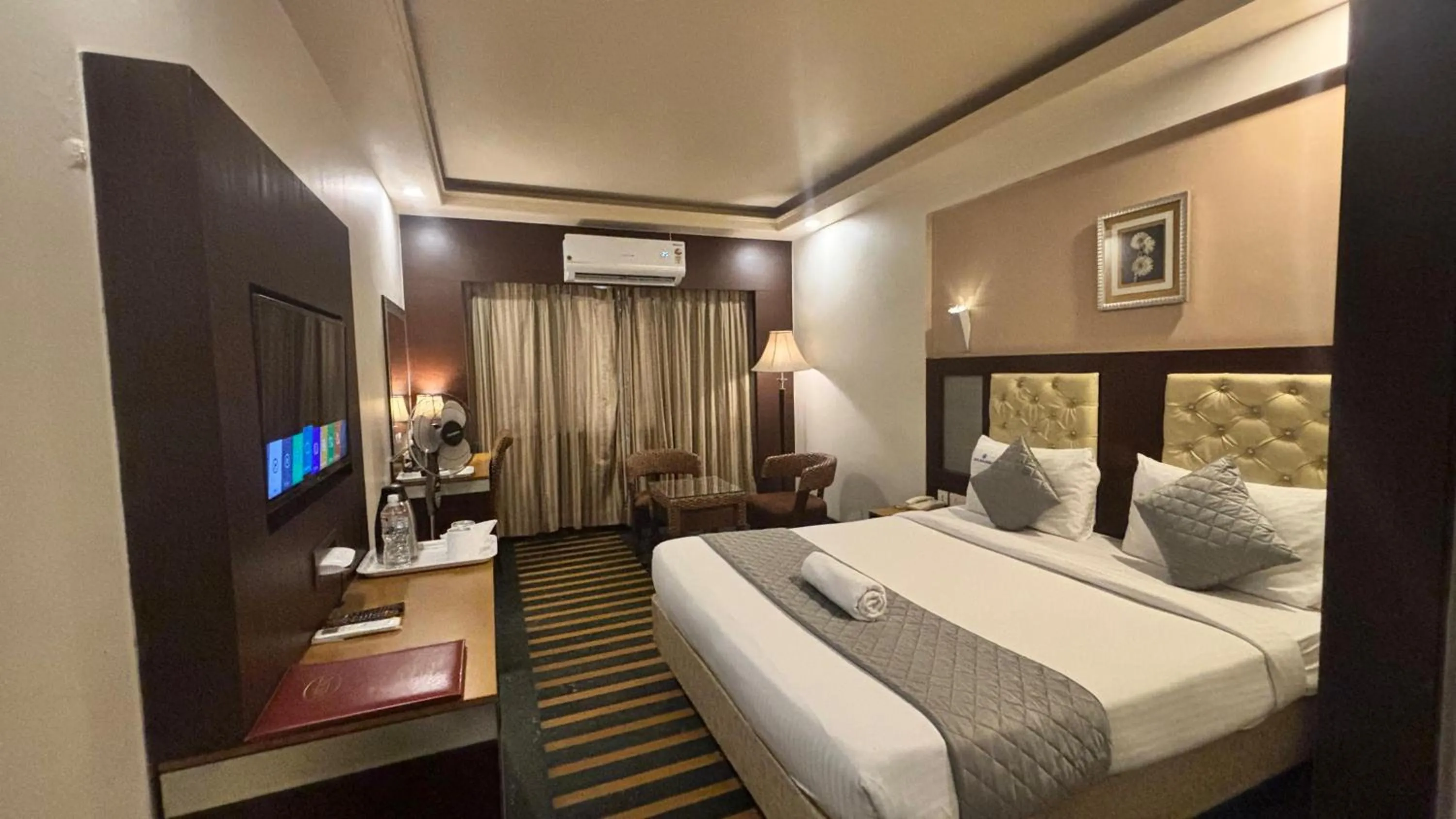 Bed in Hotel Dr Rajkumar International