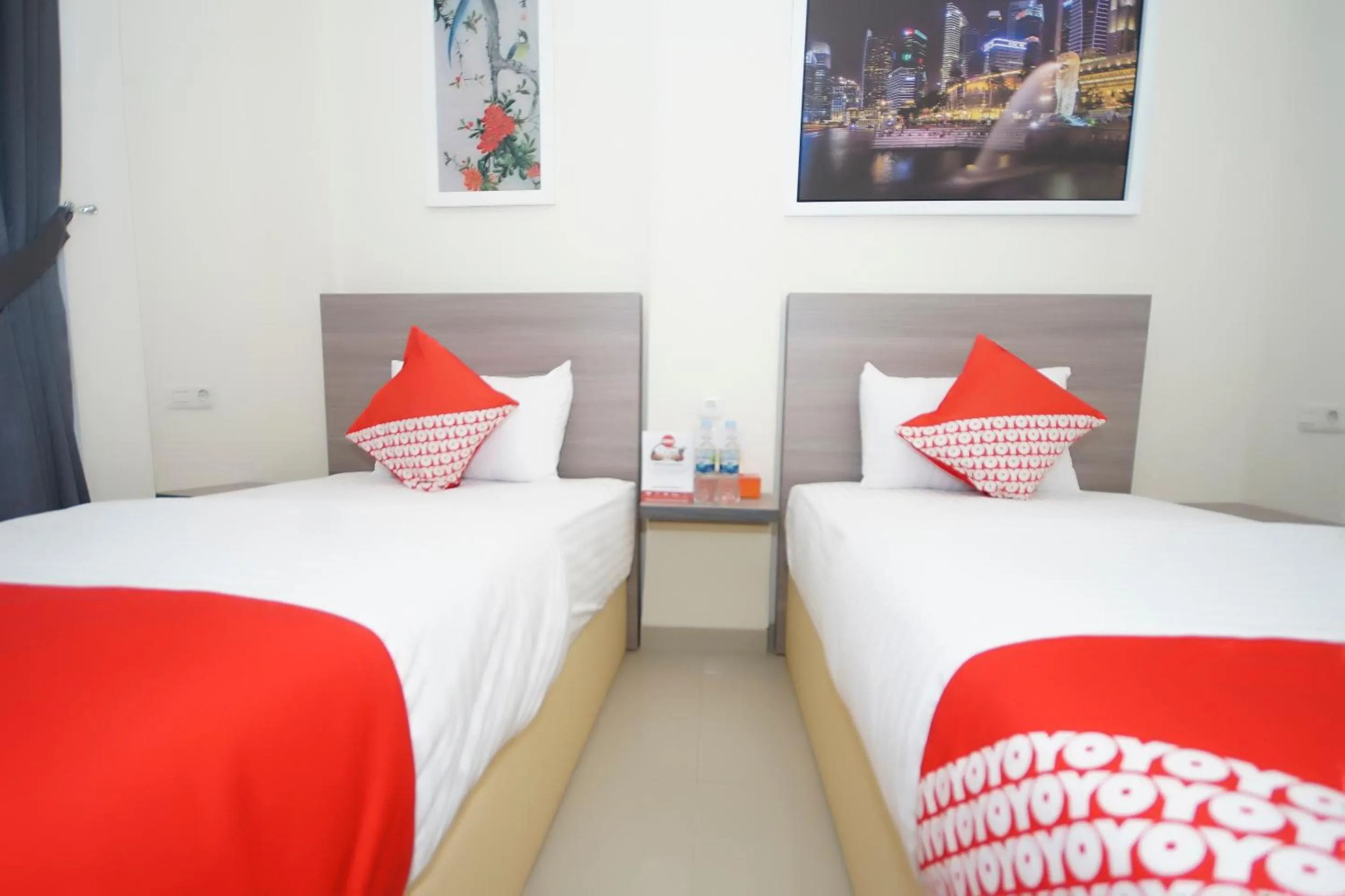 Bedroom in OYO 251 The Maximus Inn Hotel