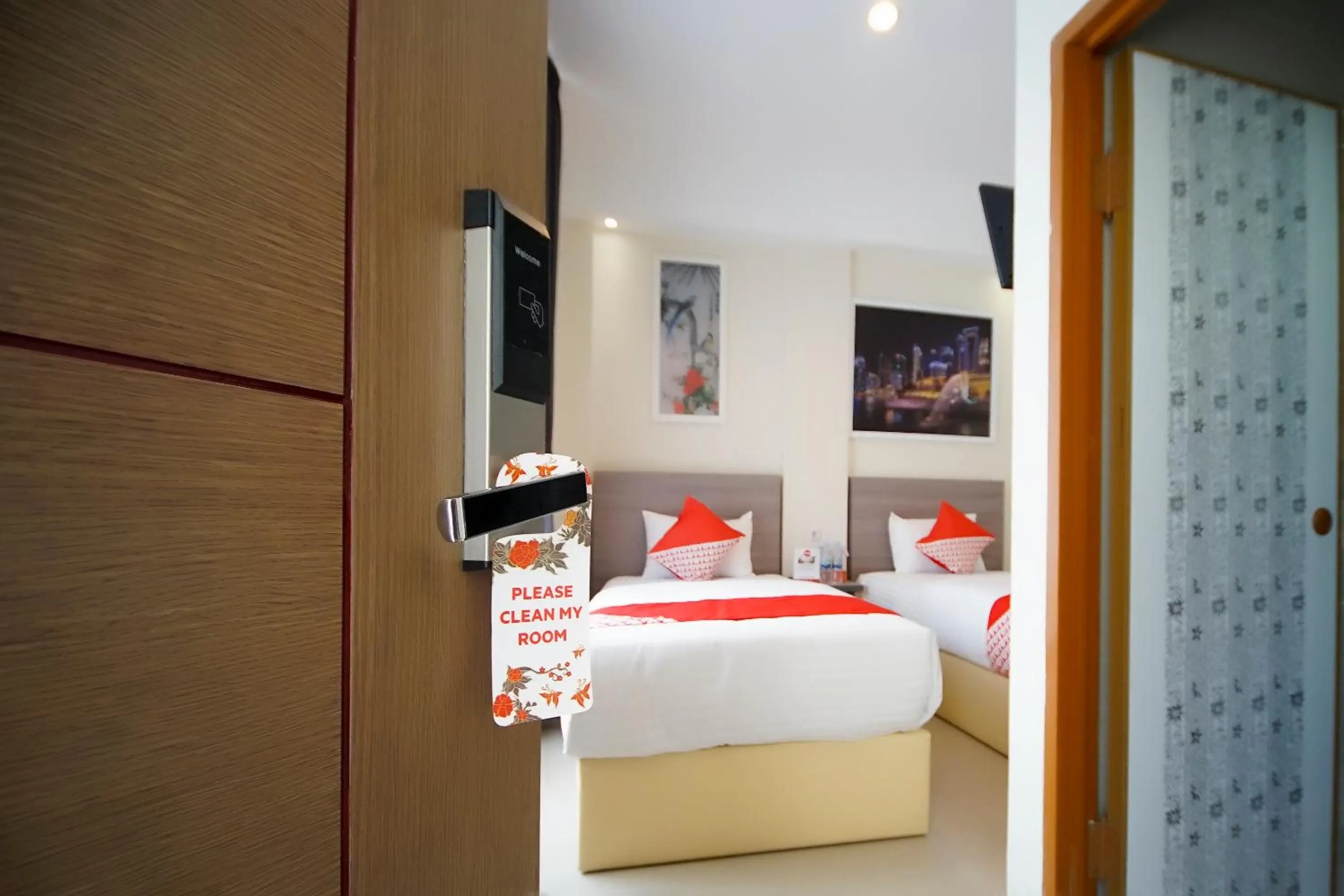 Bedroom in OYO 251 The Maximus Inn Hotel