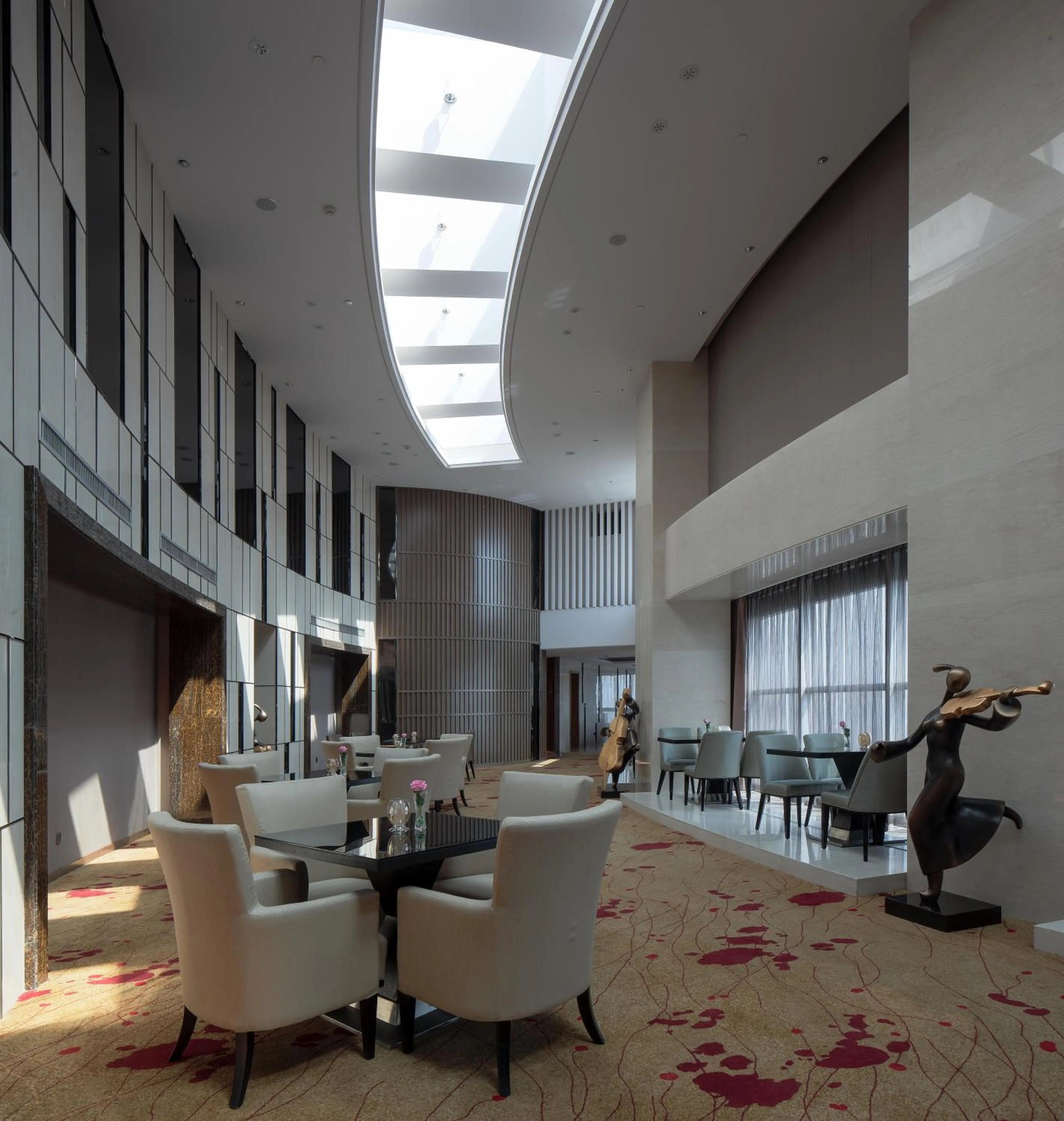 Communal lounge/ TV room in Pullman Anshan Time Square