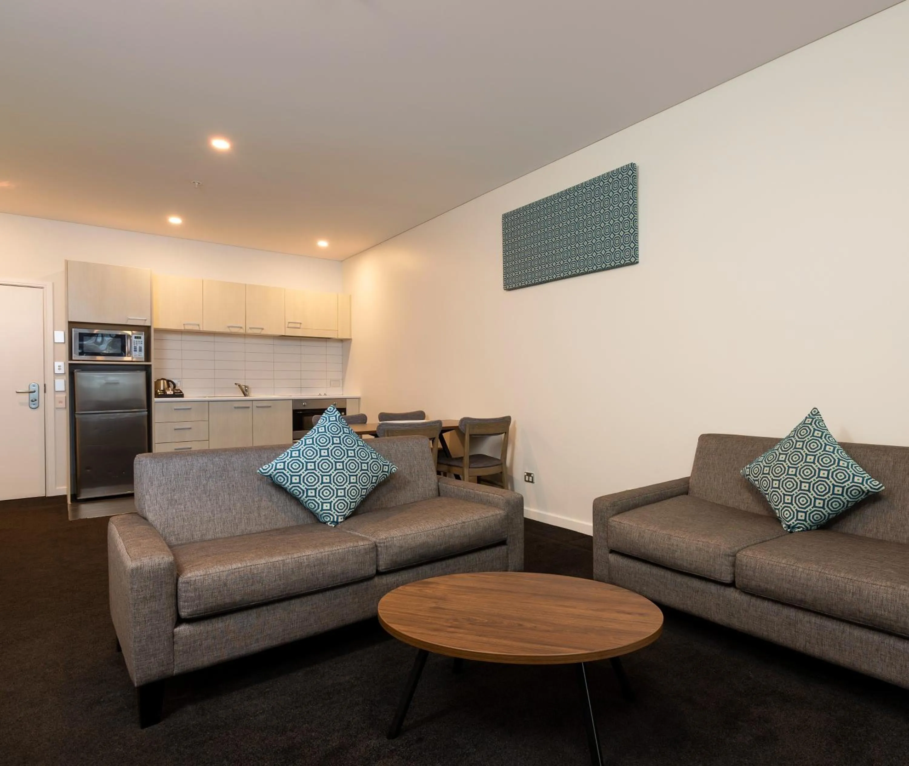 Living room in Oaks Auckland Hotel