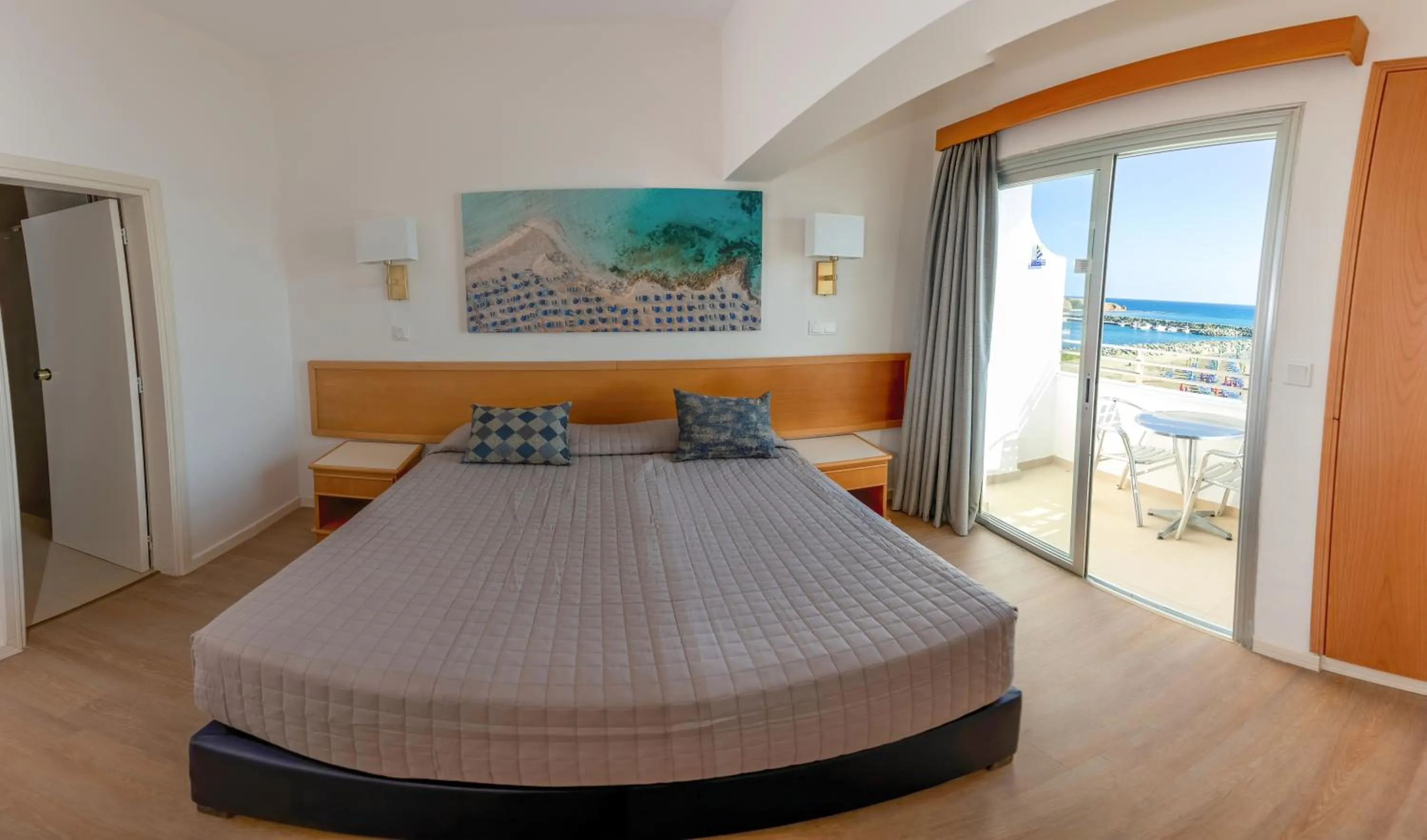 Bed in Tylos Beach Hotel