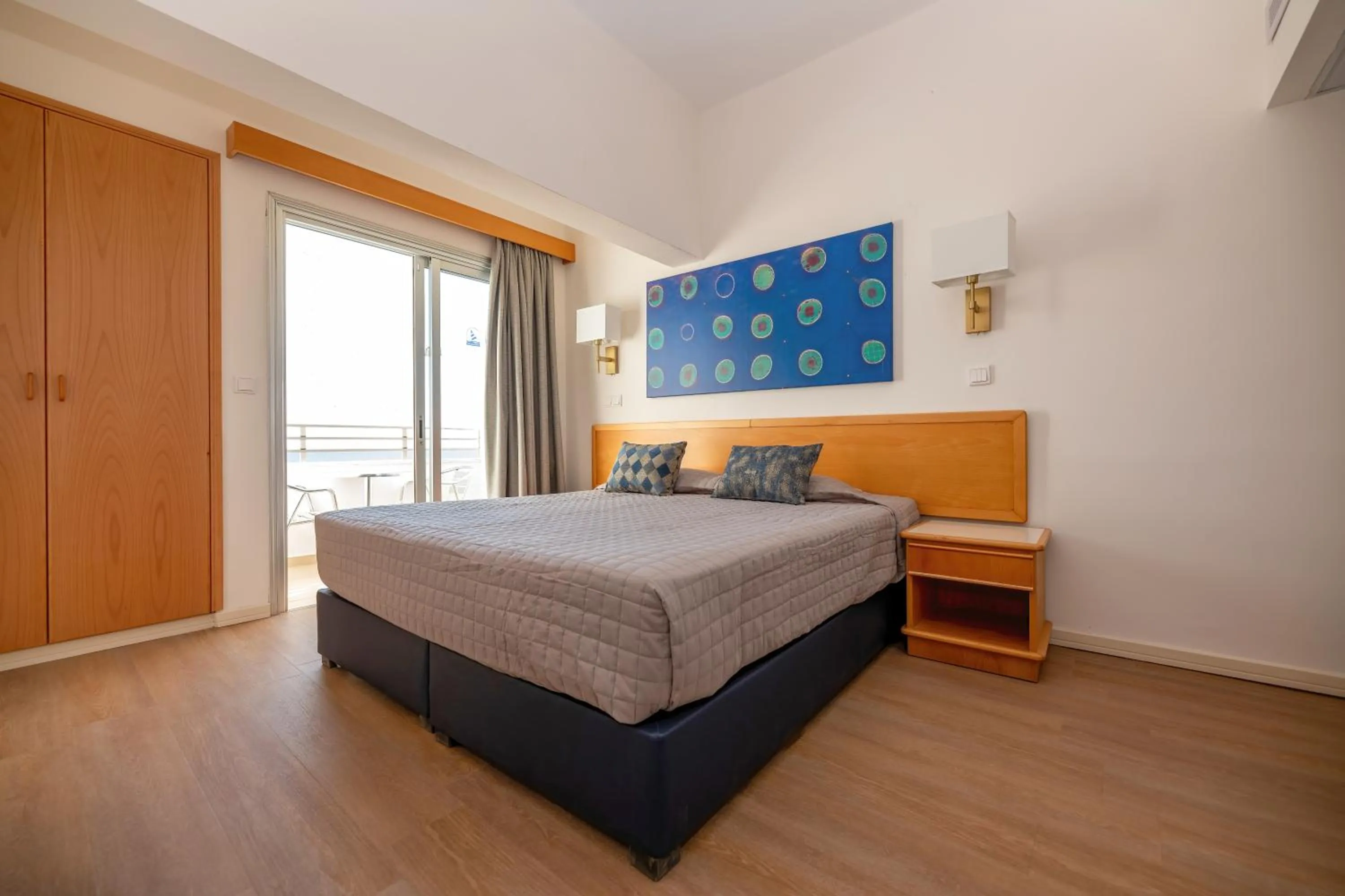 Bed in Tylos Beach Hotel