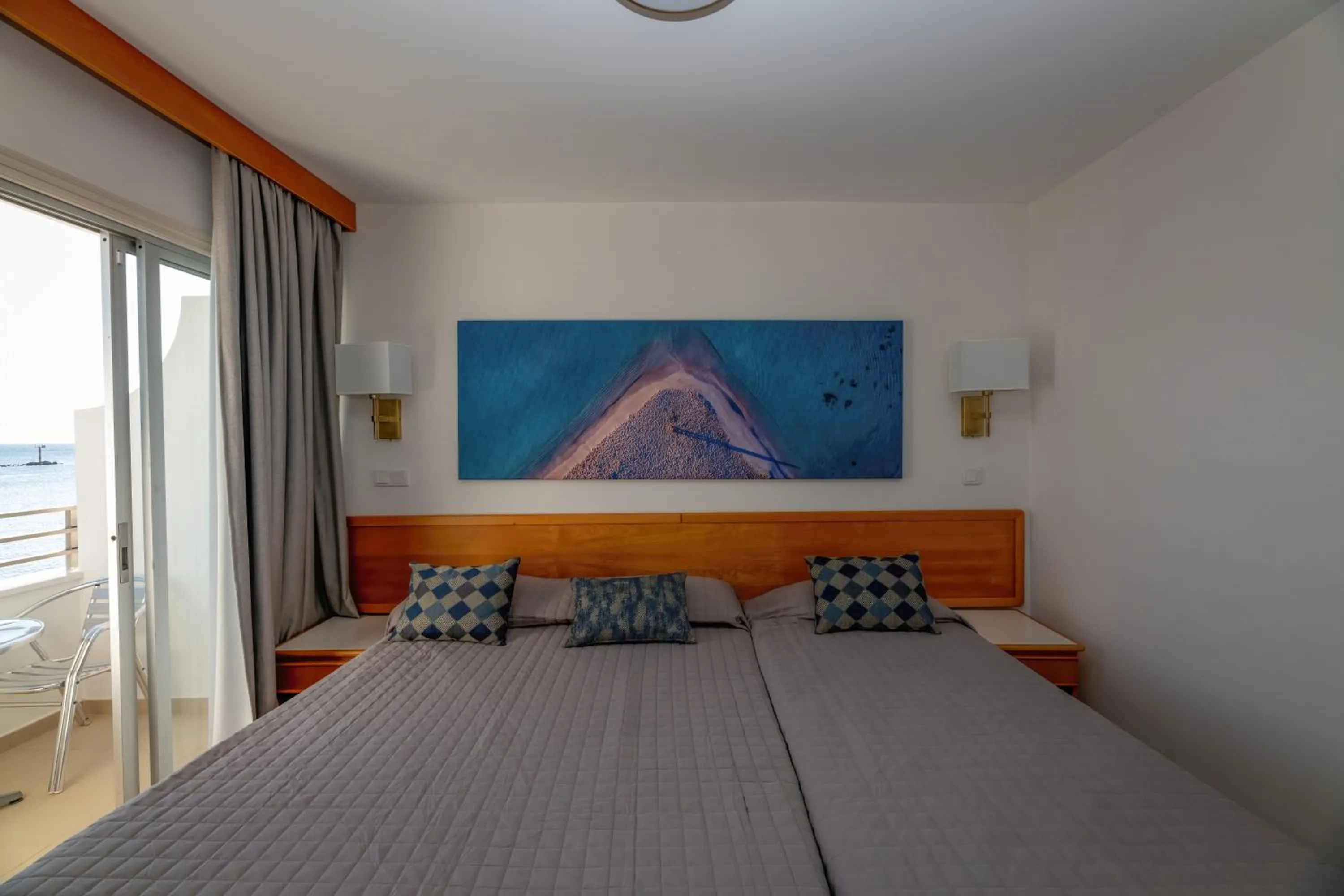 Bed in Tylos Beach Hotel