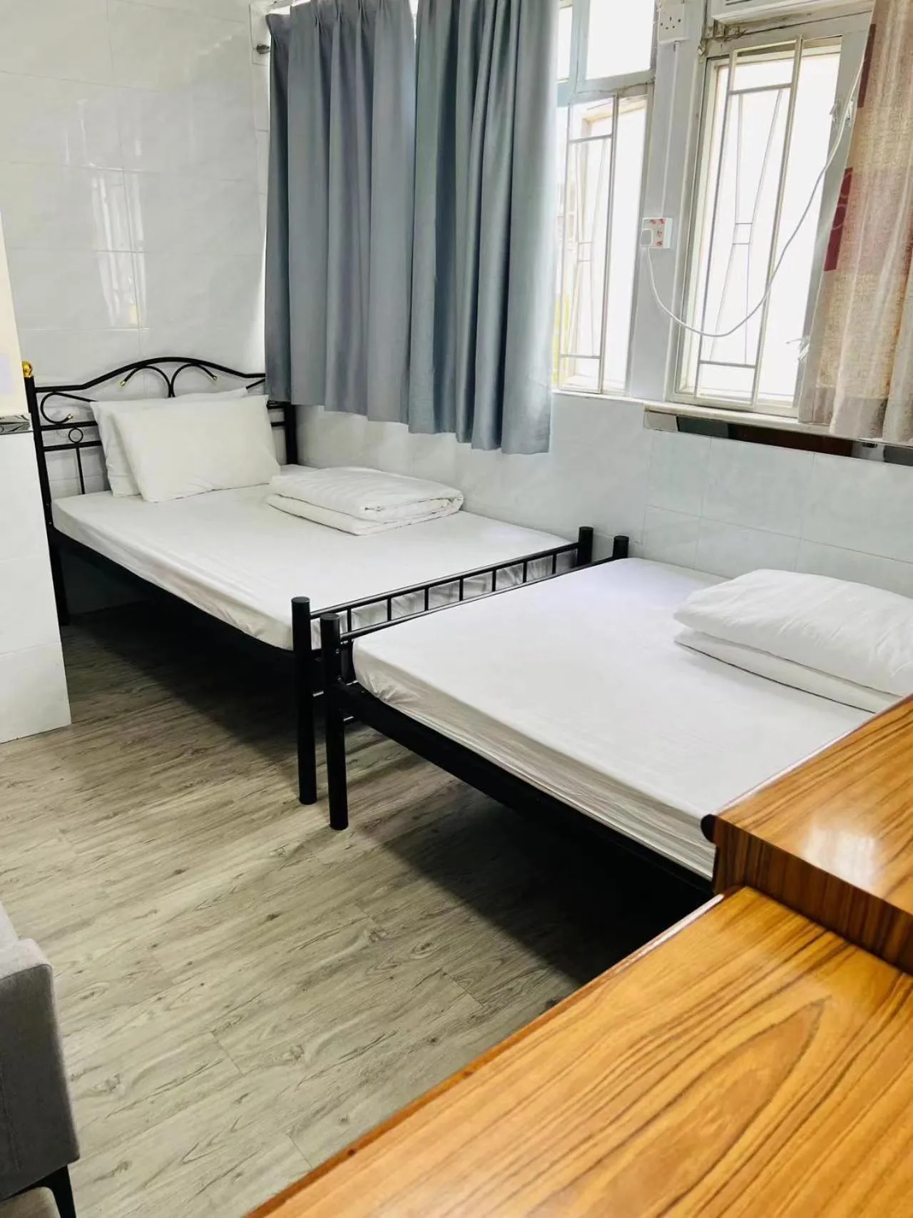 Bed in 嘉應賓館HAKKAS GUEST House