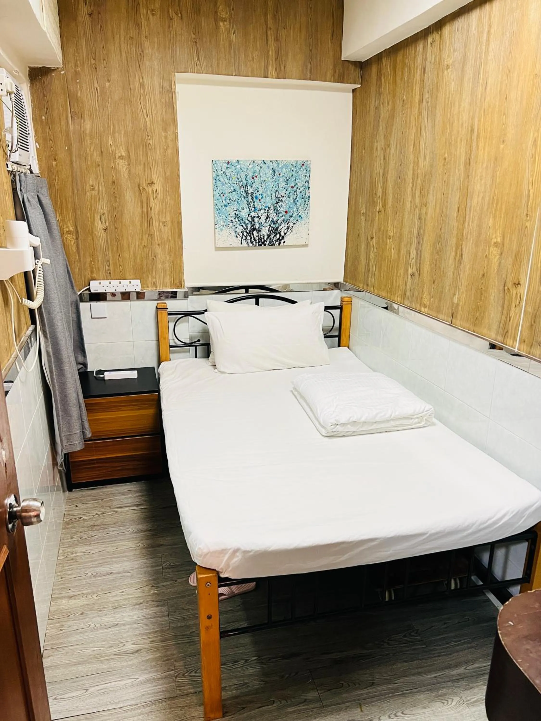 Bed in 嘉應賓館HAKKAS GUEST House