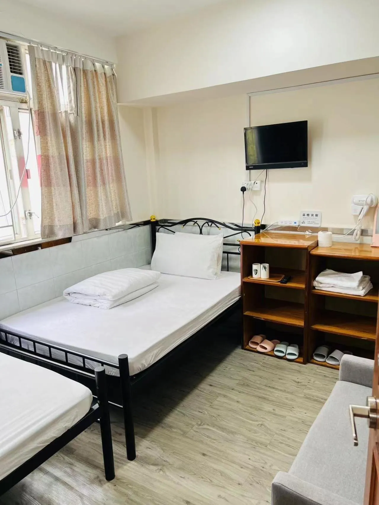 Bed in 嘉應賓館HAKKAS GUEST House