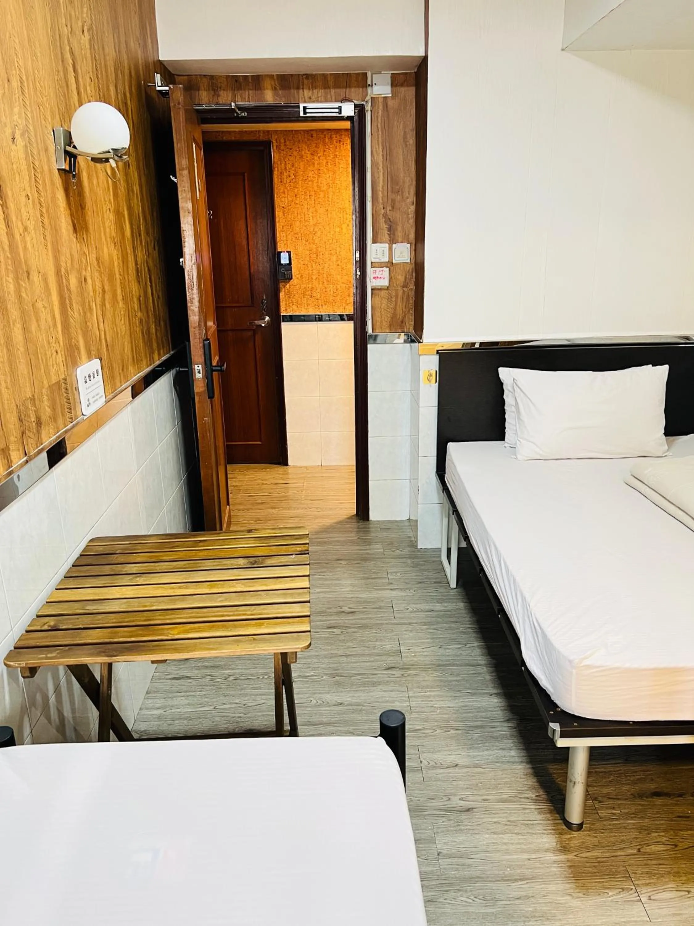 Bed in 嘉應賓館HAKKAS GUEST House