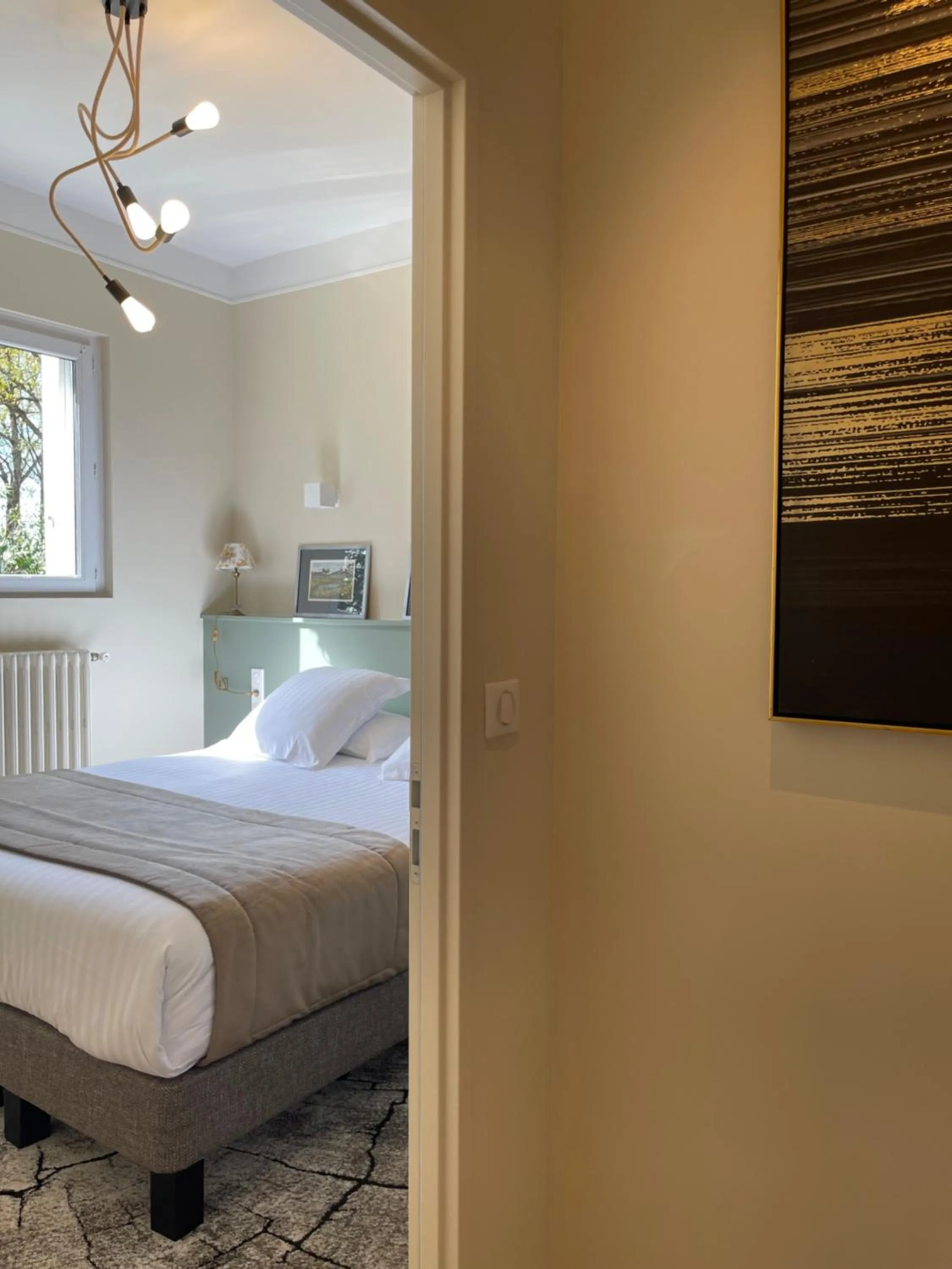 Bed in Hôtel du Golf Saint Lazare