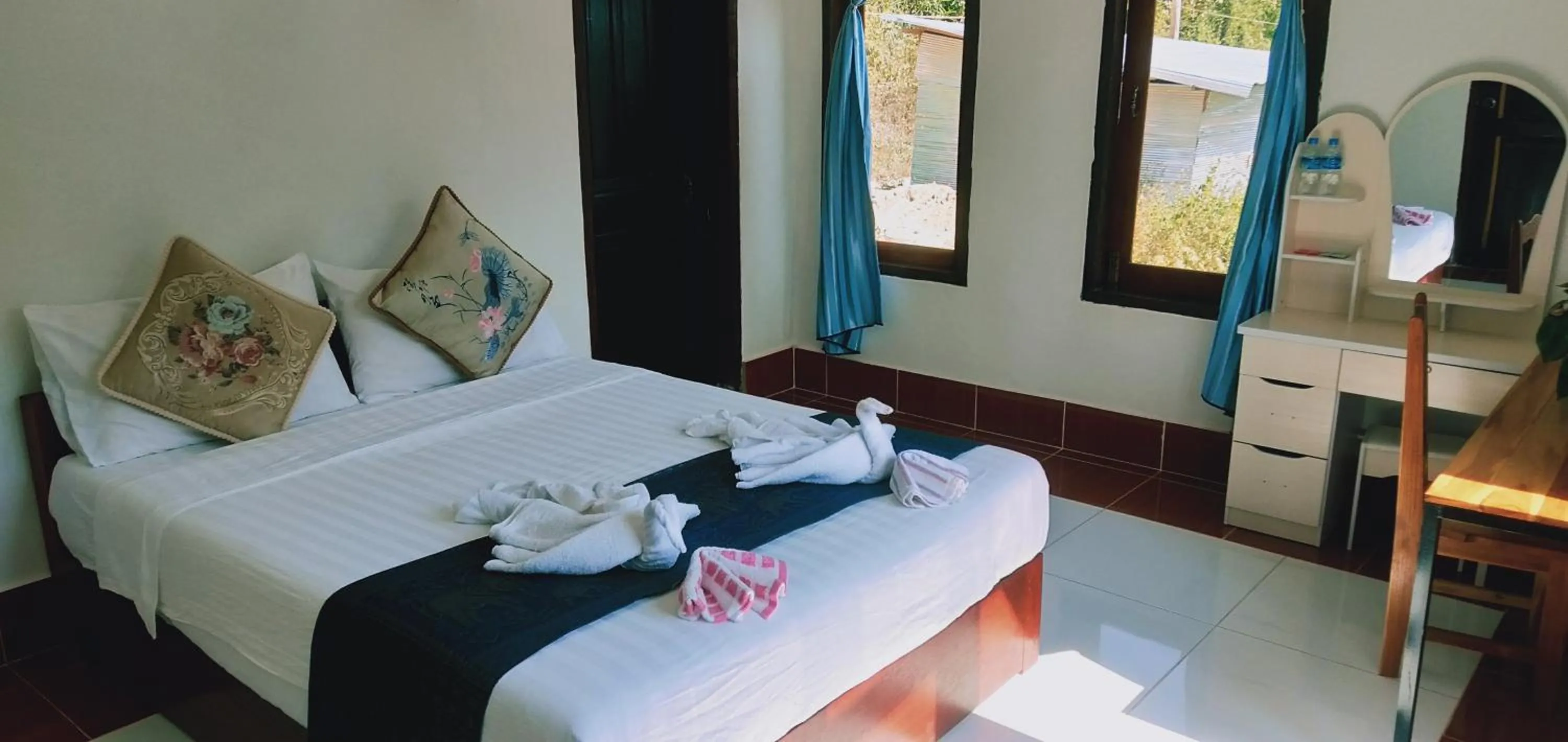 Bed in Villa Mekong Guesthouse