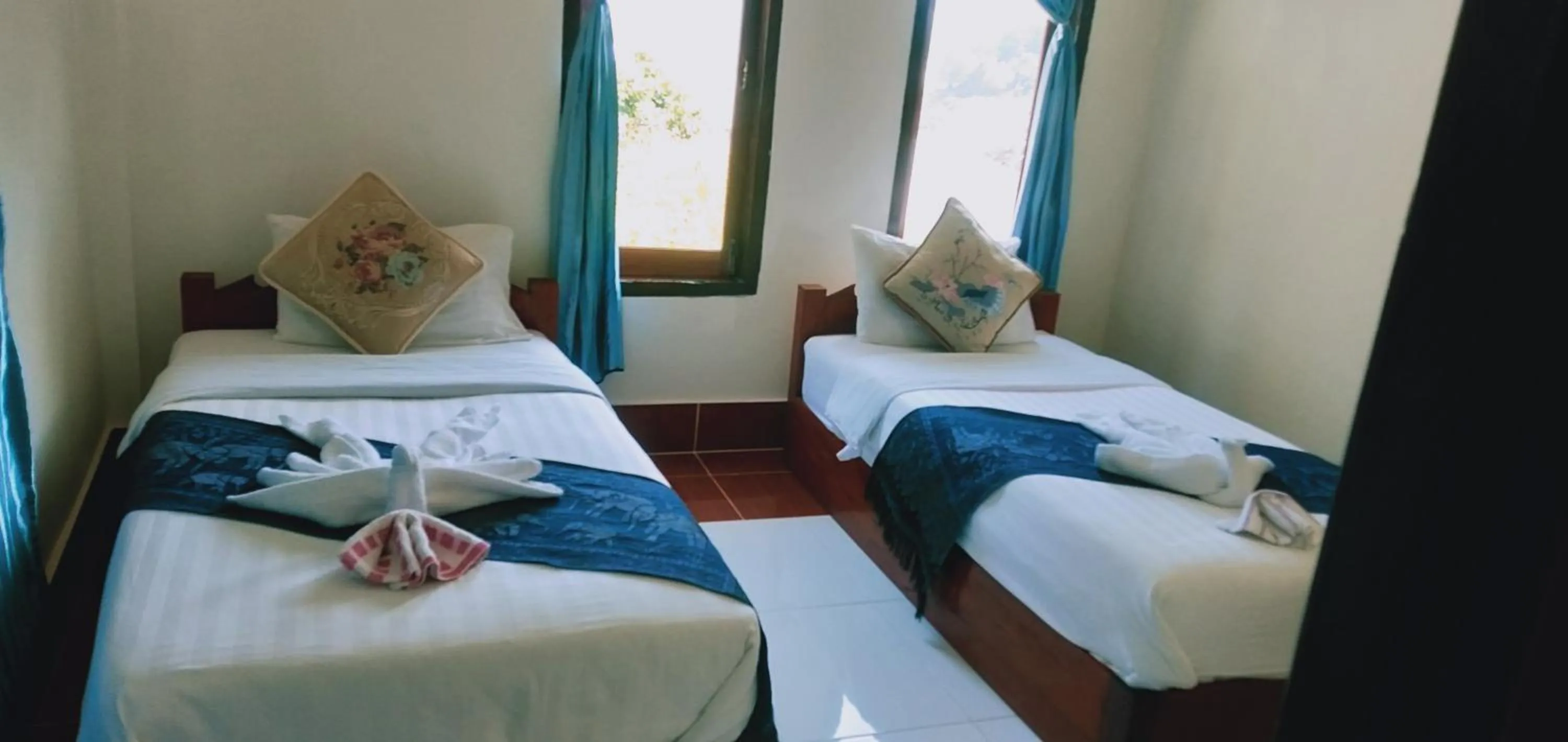 Bed in Villa Mekong Guesthouse