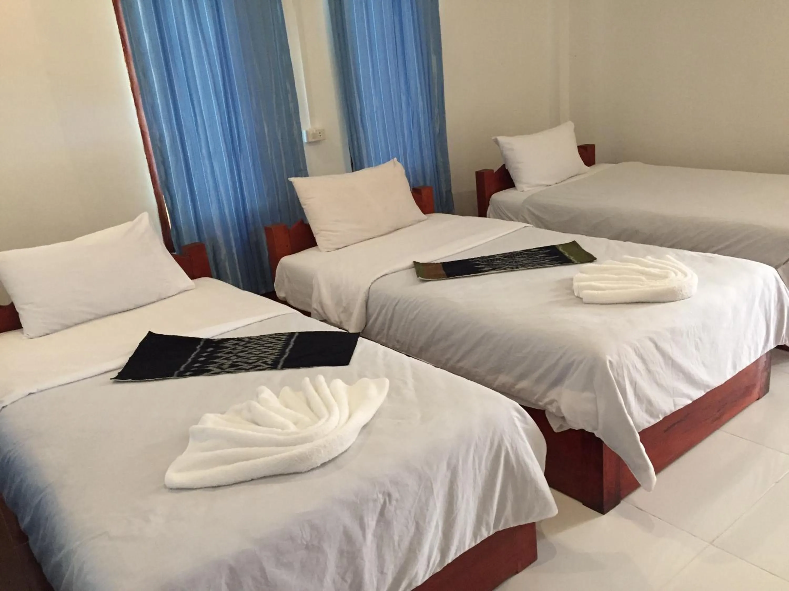 Bed in Villa Mekong Guesthouse