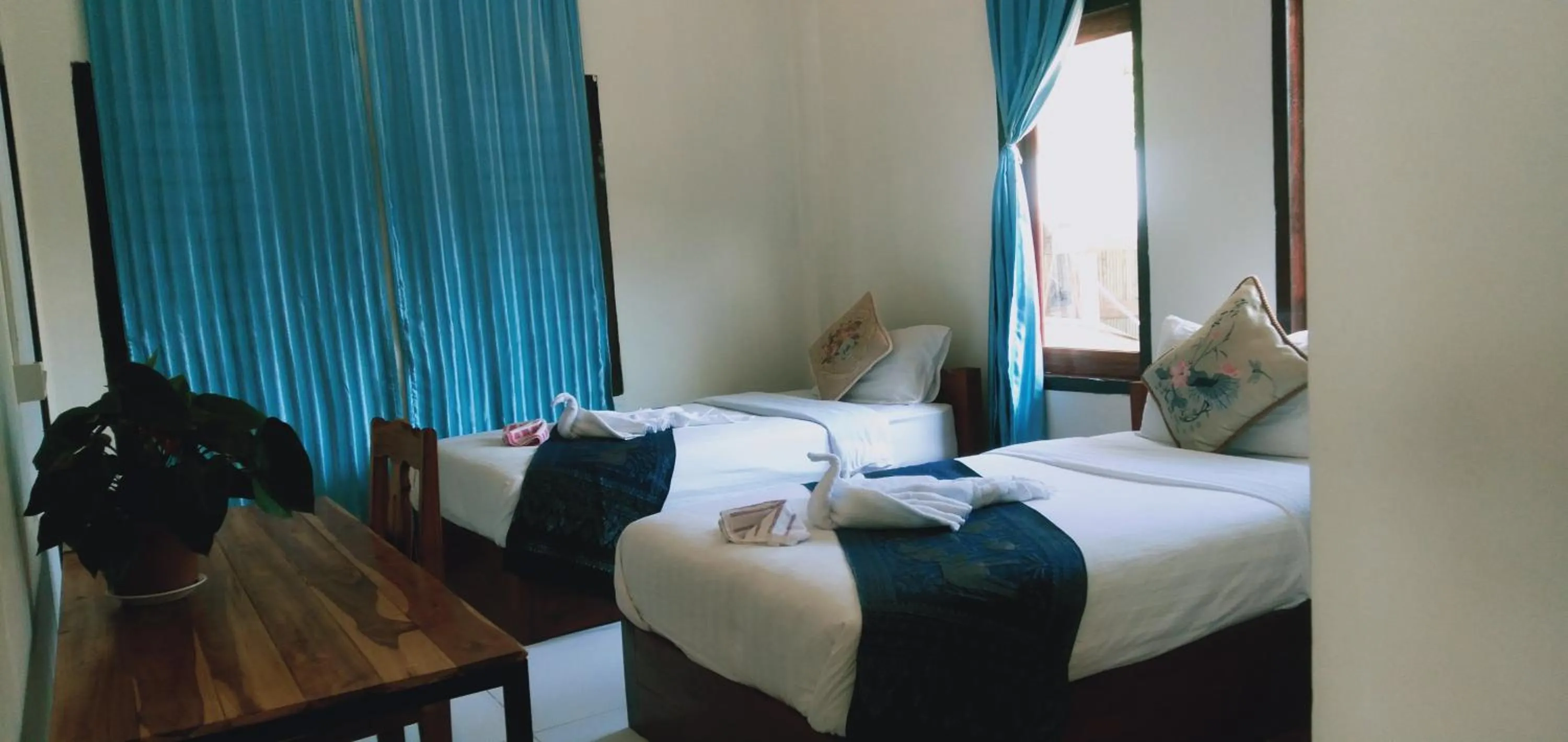 Bed in Villa Mekong Guesthouse