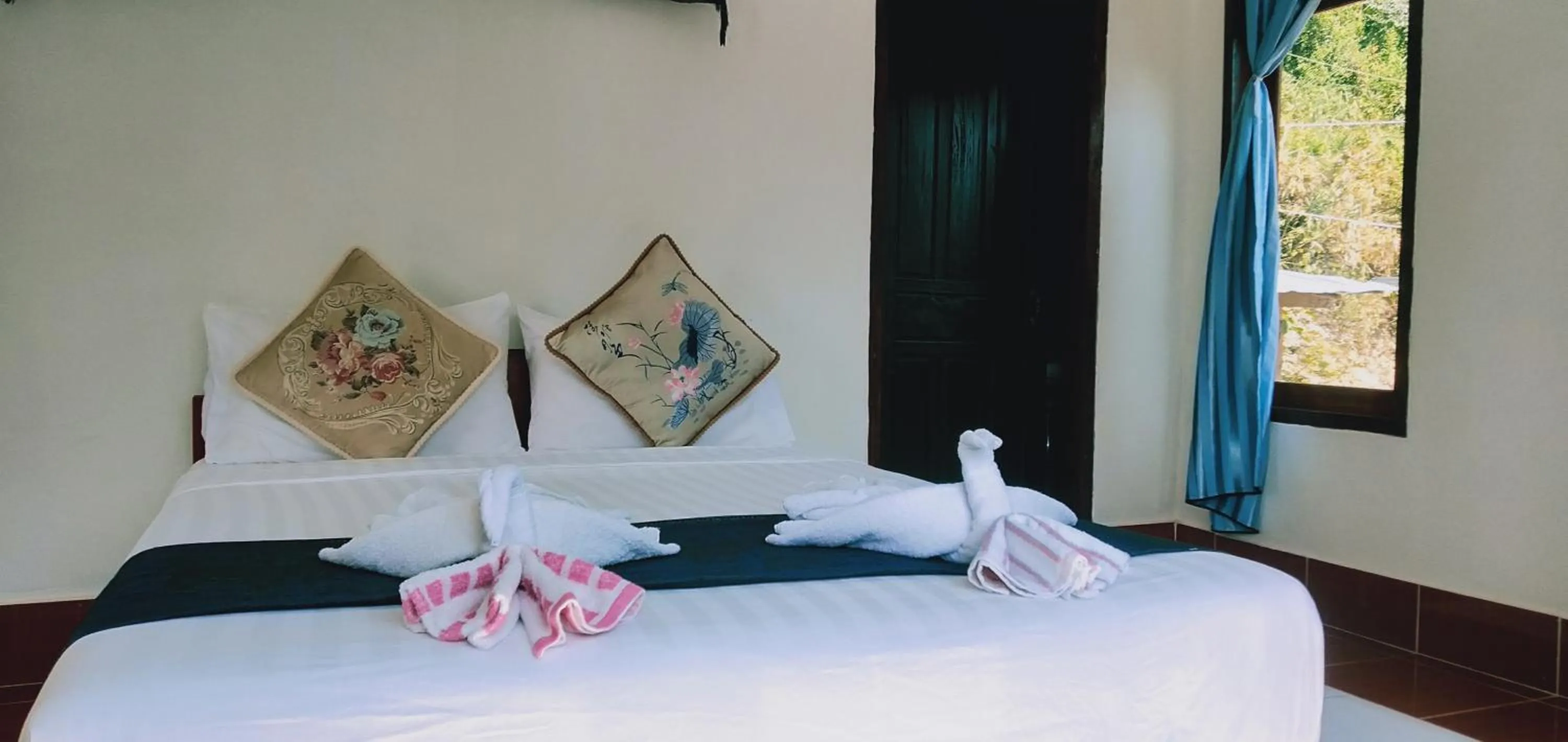 Bed in Villa Mekong Guesthouse