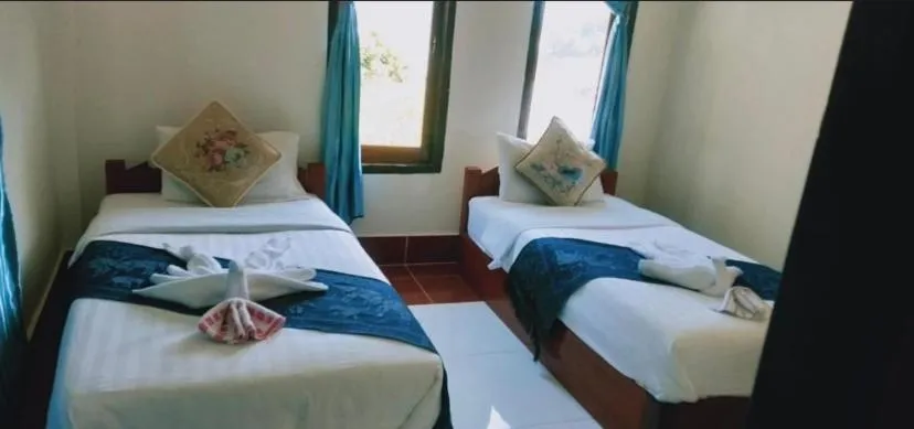 Bed in Villa Mekong Guesthouse
