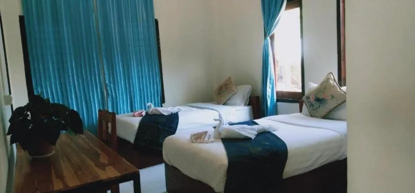 Bed in Villa Mekong Guesthouse