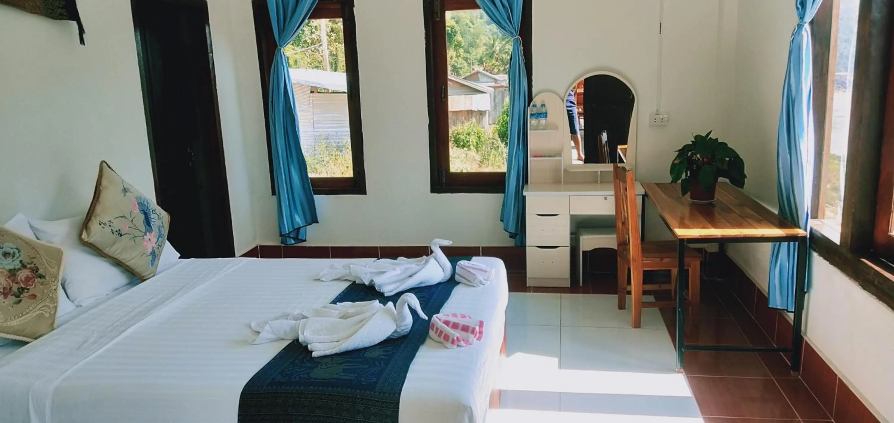 Bed in Villa Mekong Guesthouse