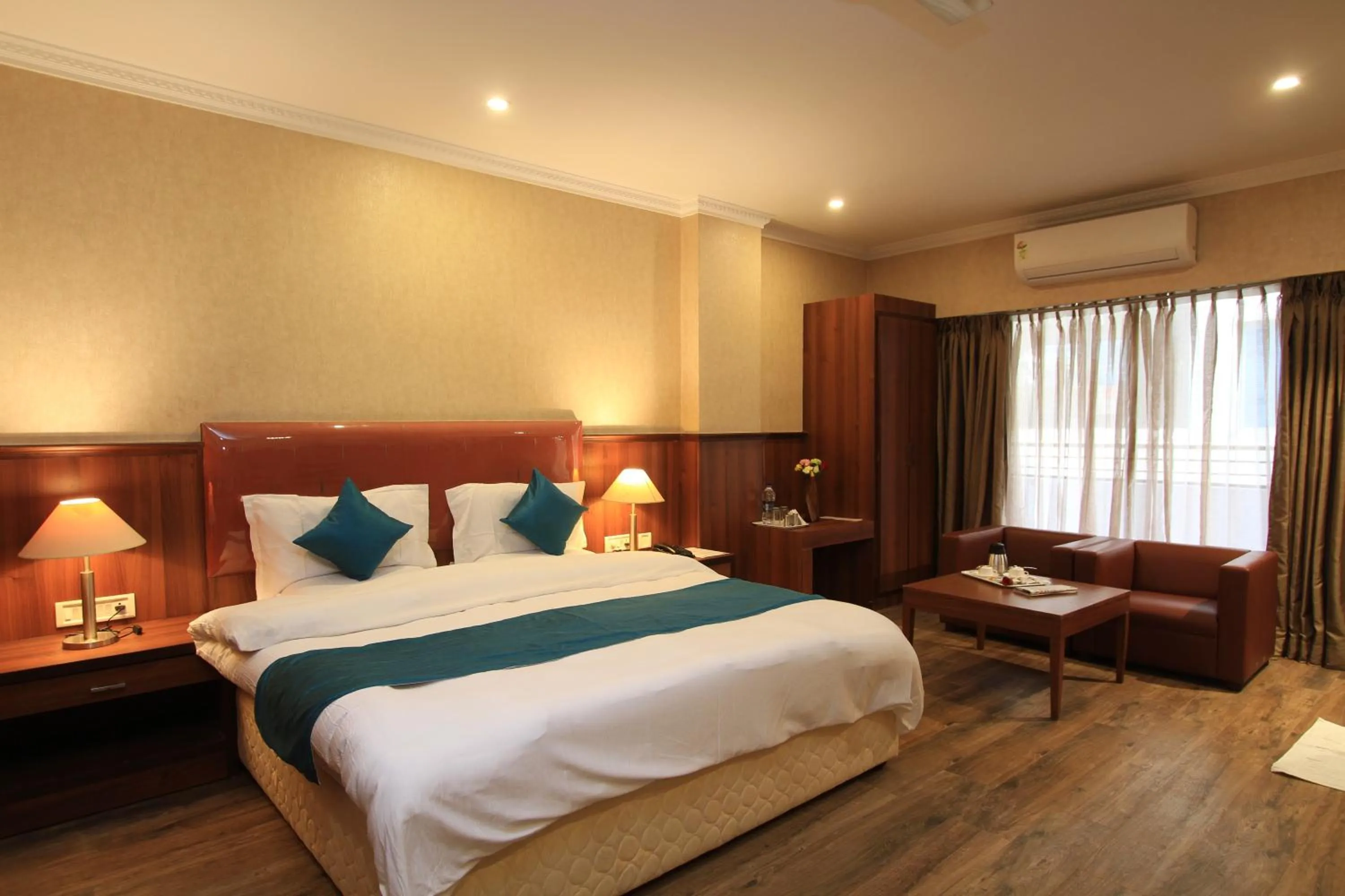 Bed in Hotel Noor Empire International Kormangala