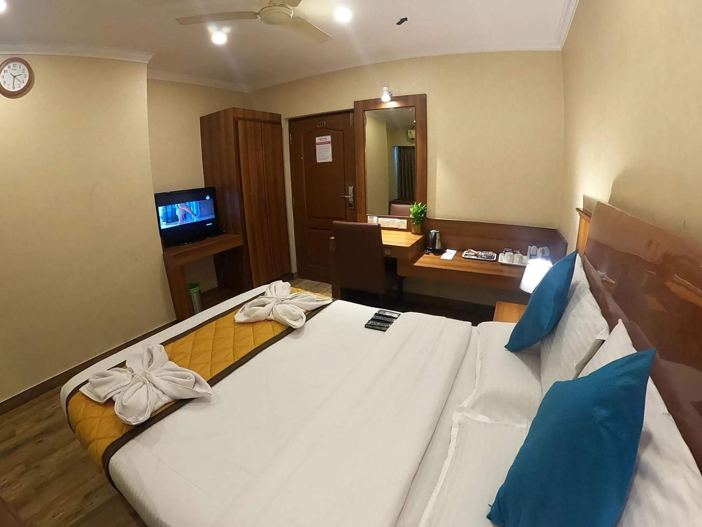 Bed in Hotel Noor Empire International Kormangala