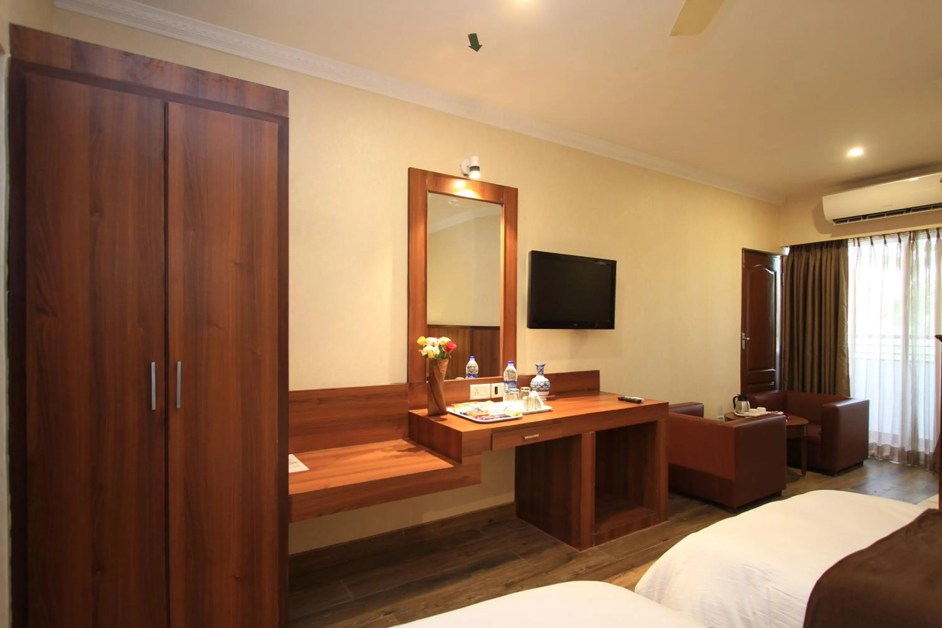 Bed in Hotel Noor Empire International Kormangala