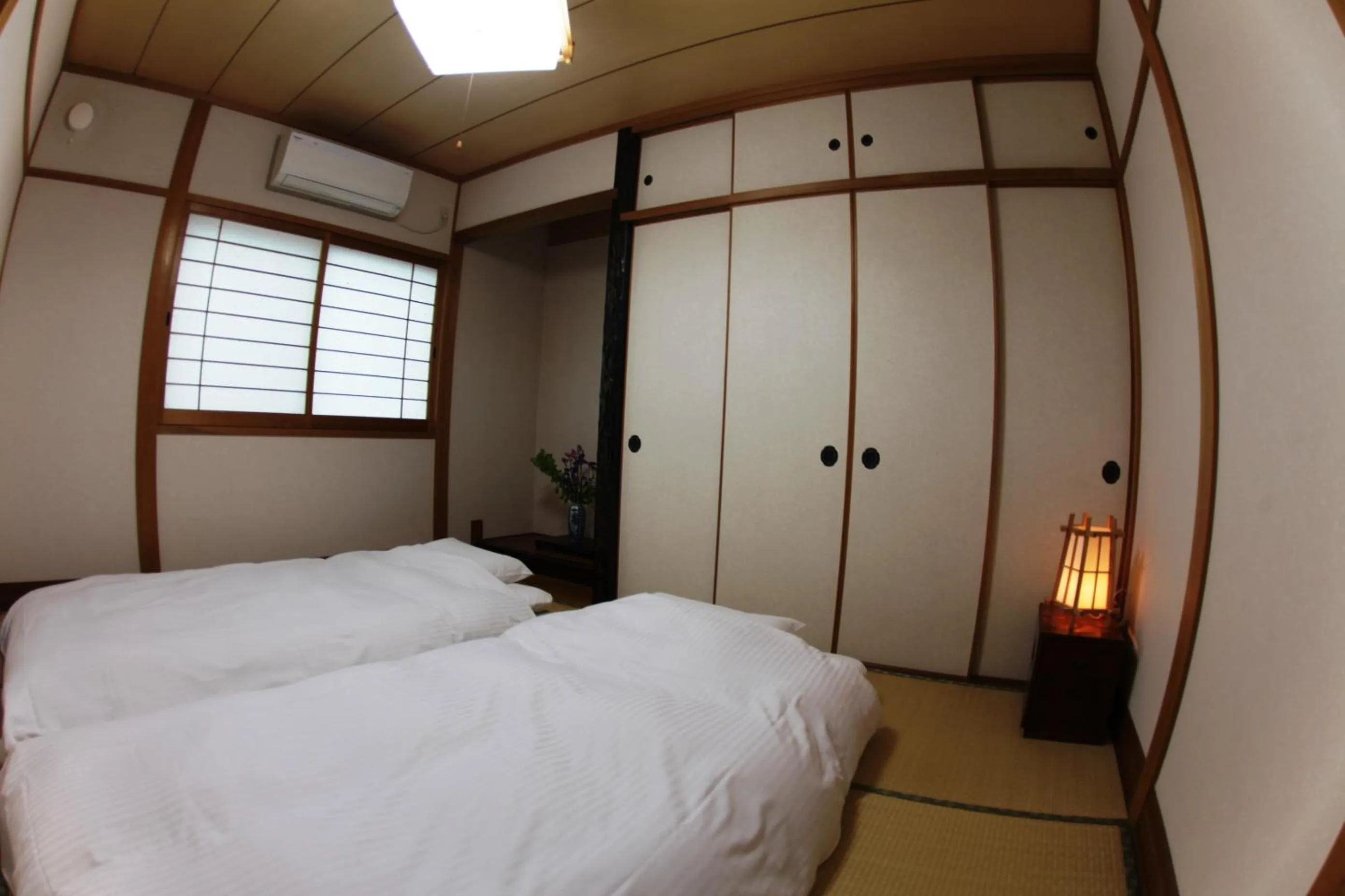 Bedroom, Bed in Stay Omihachiman Ekimae Inn