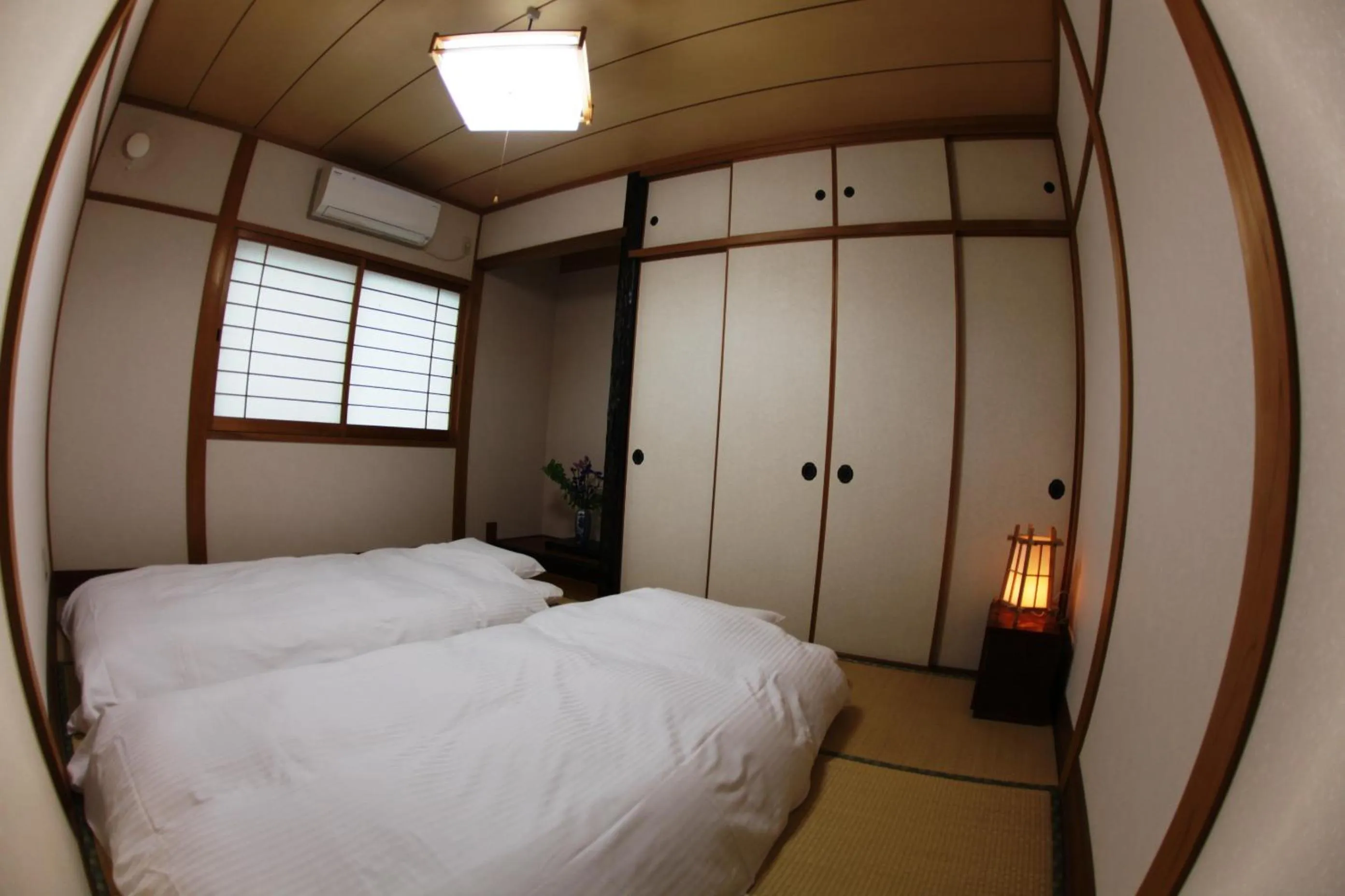 Bedroom, Bed in Stay Omihachiman Ekimae Inn