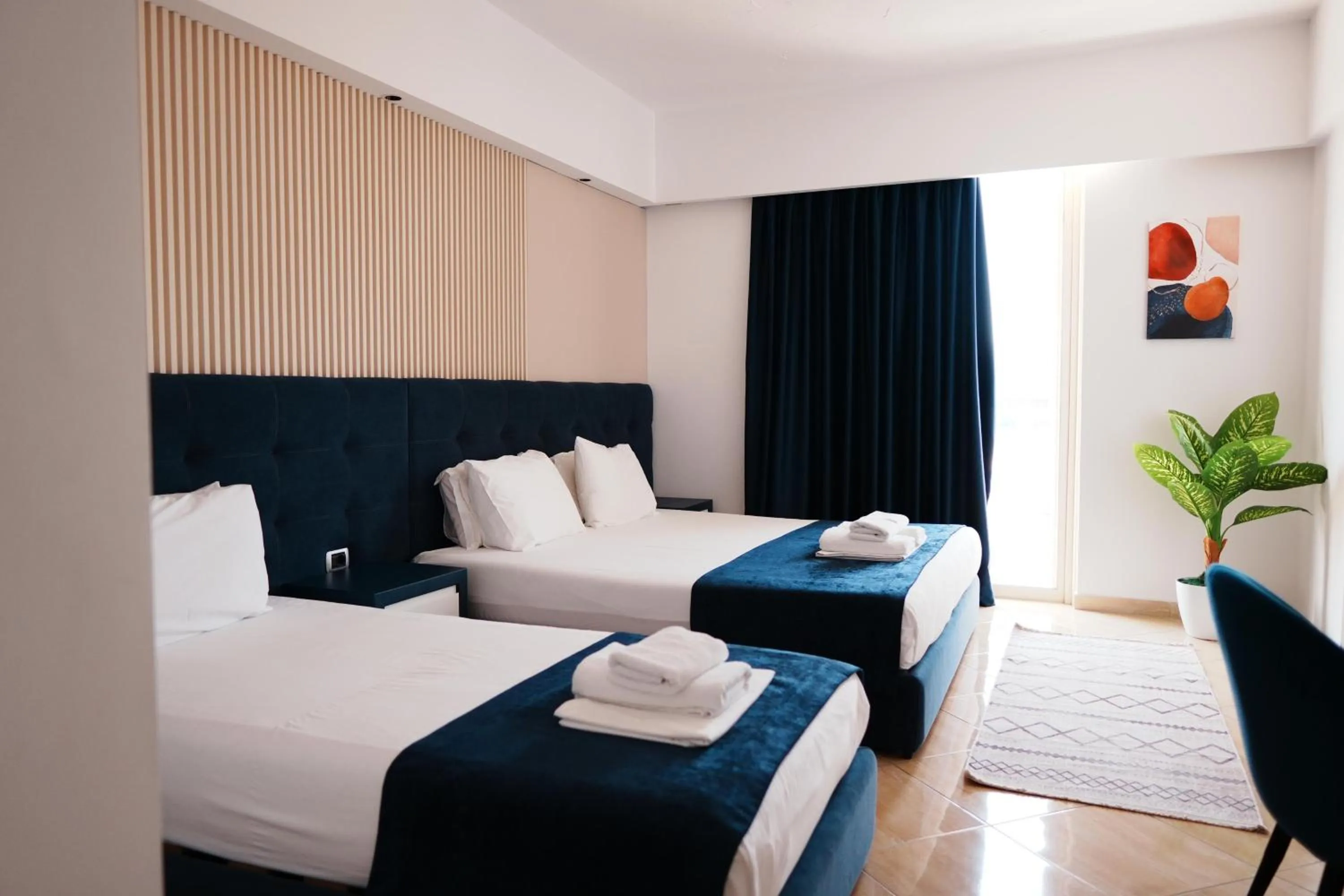 Bed in Hotel Blue Sky