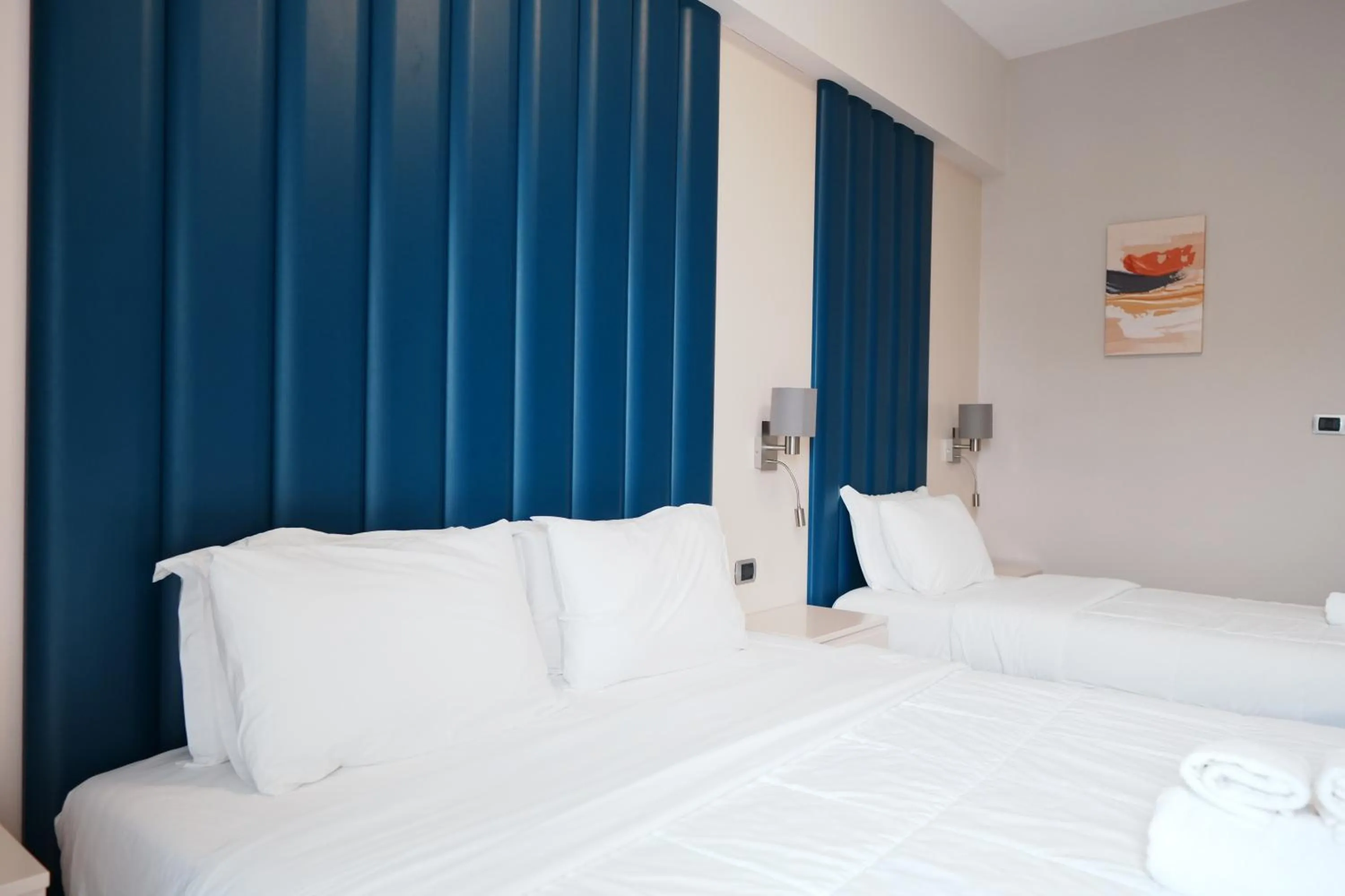 Bed in Hotel Blue Sky