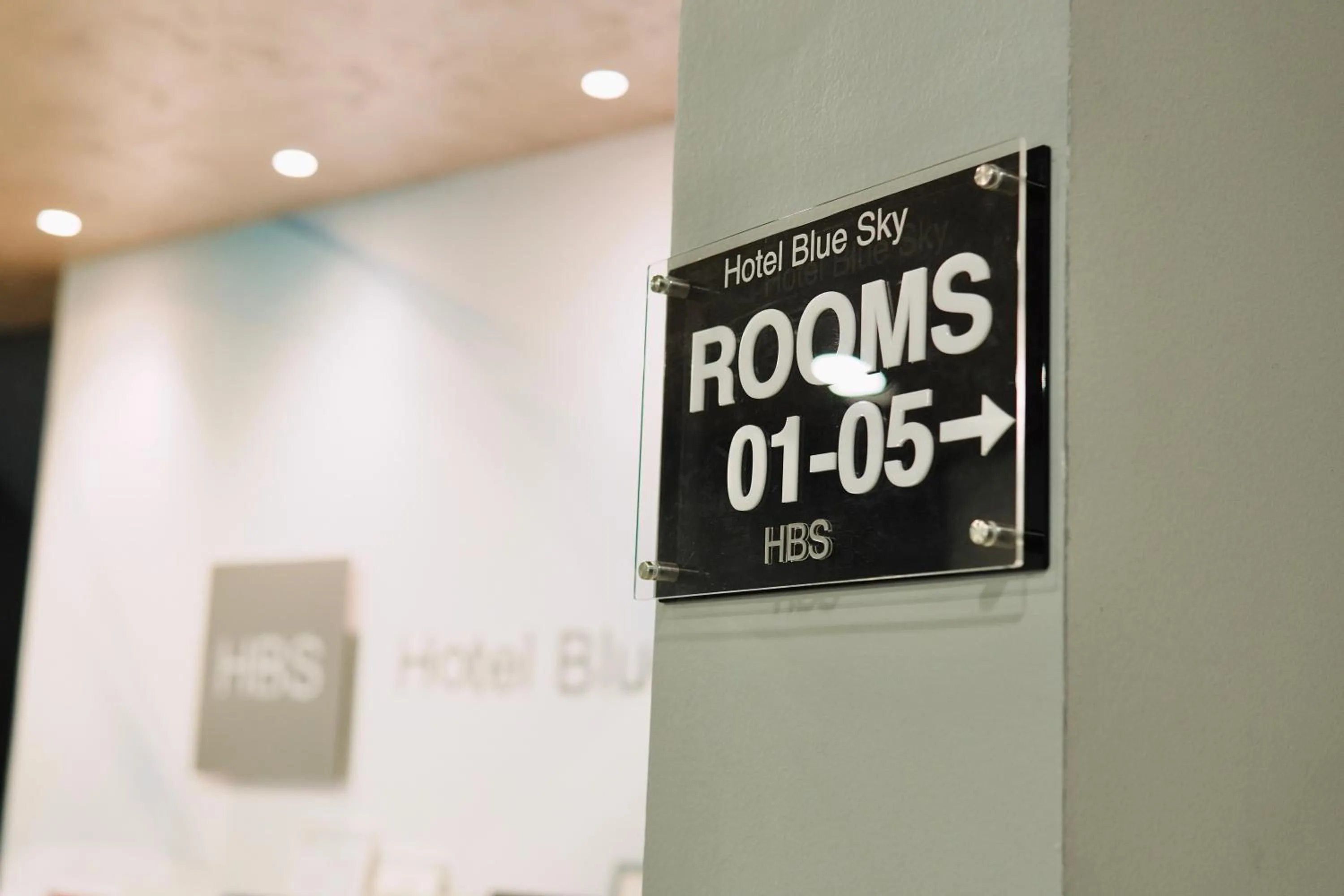 Property logo or sign in Hotel Blue Sky