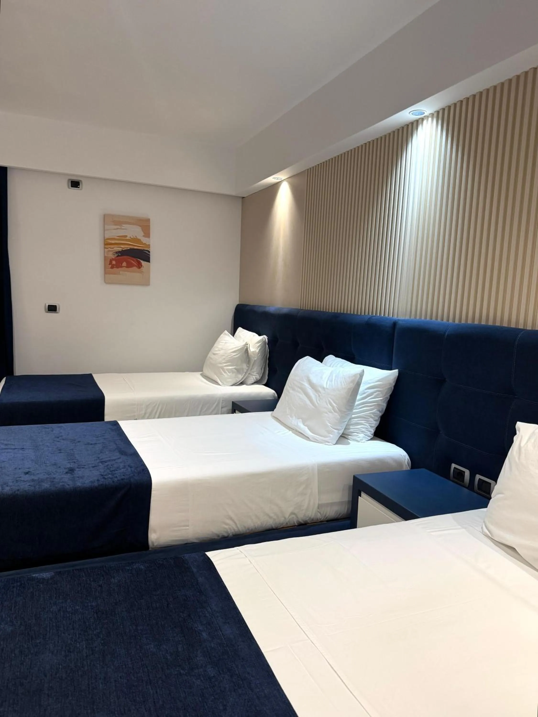 Property building, Bed in Hotel Blue Sky