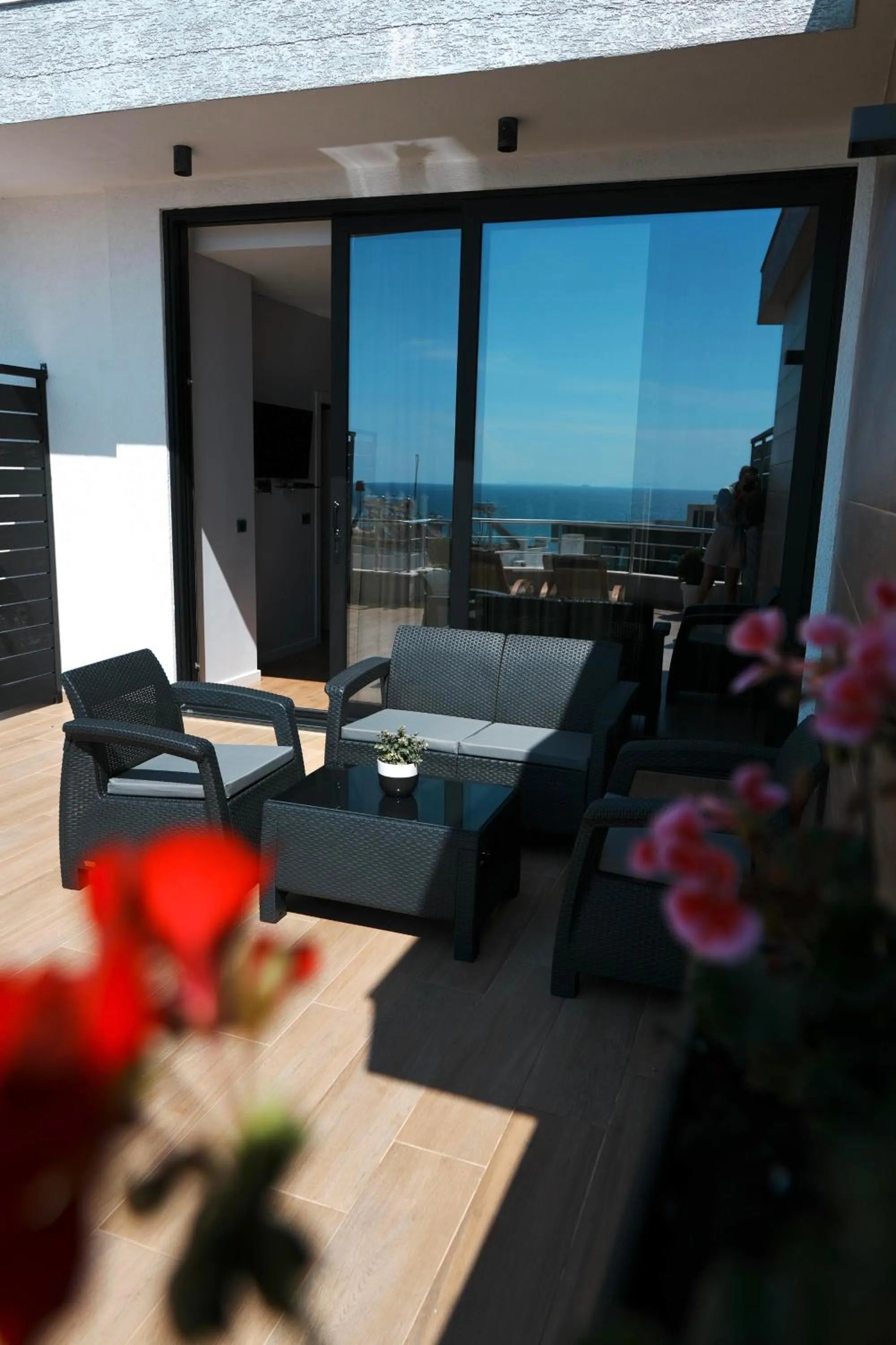 Communal lounge/ TV room in Hotel Blue Sky