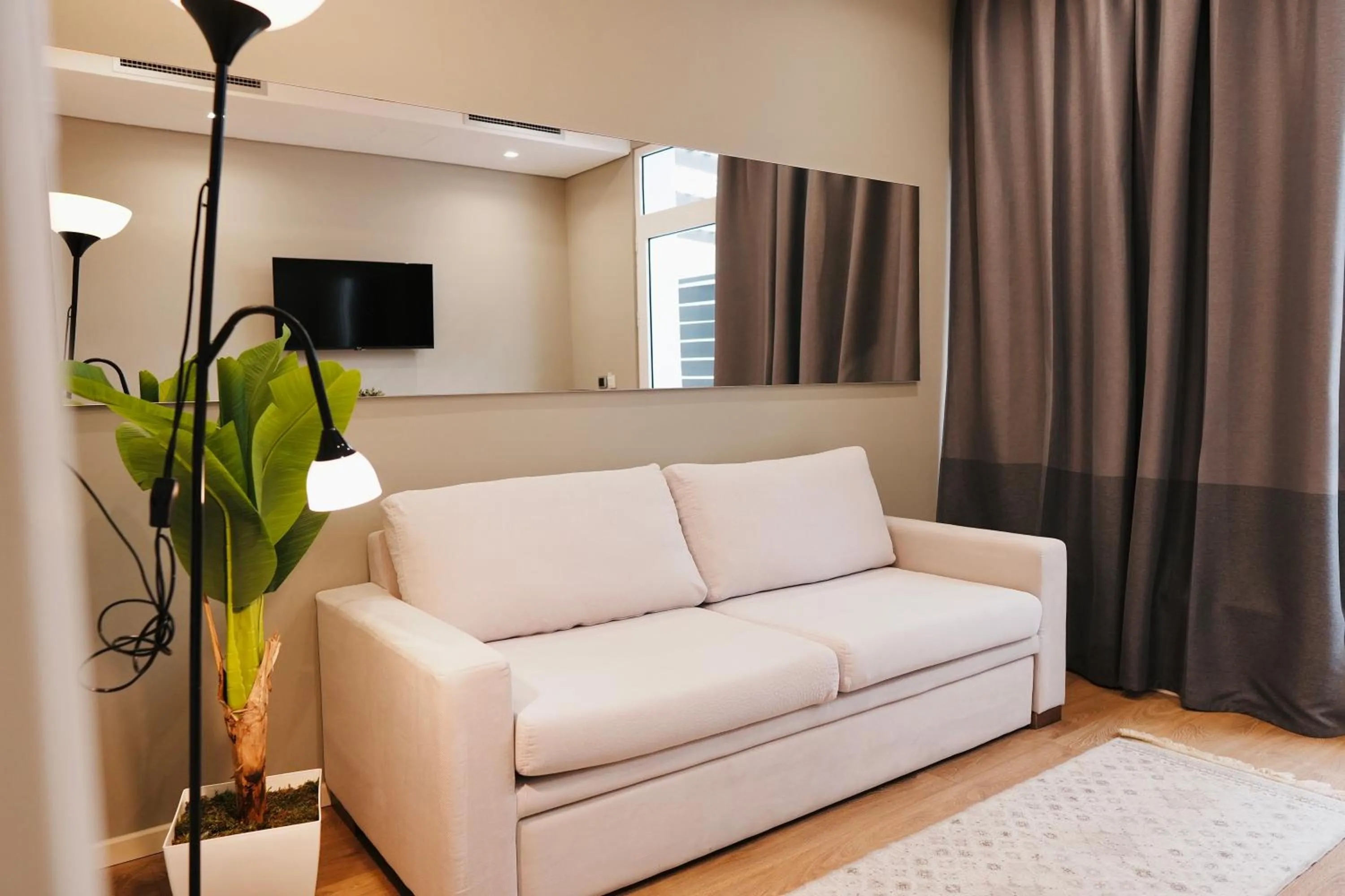 Communal lounge/ TV room in Hotel Blue Sky