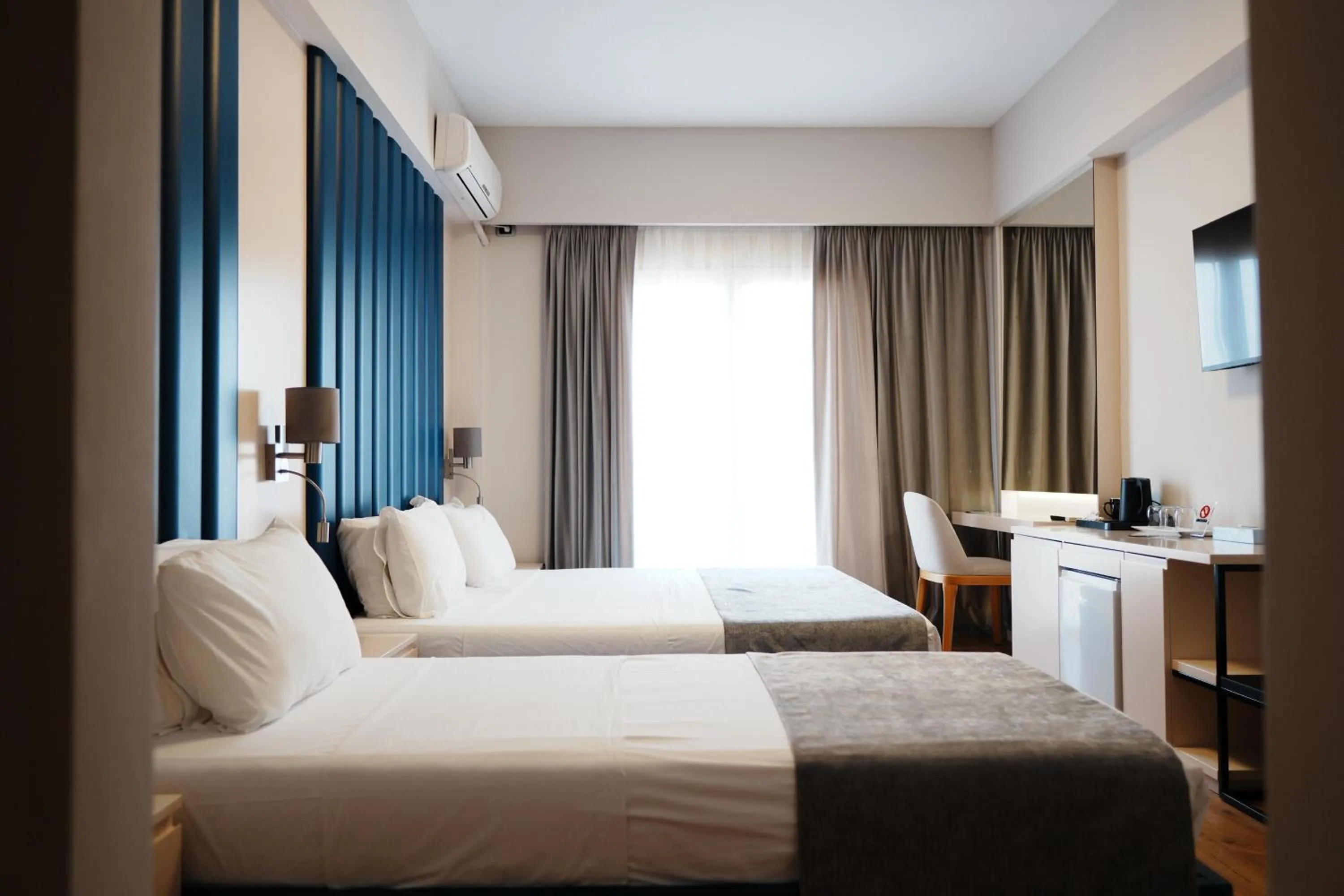 Bed in Hotel Blue Sky