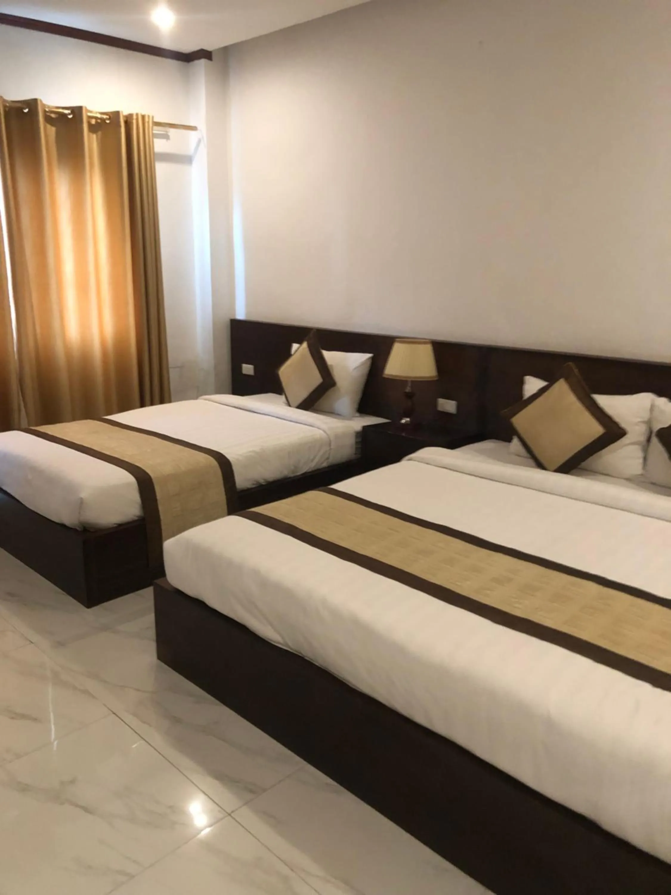 Bed in Premier Vang Vieng Hotel
