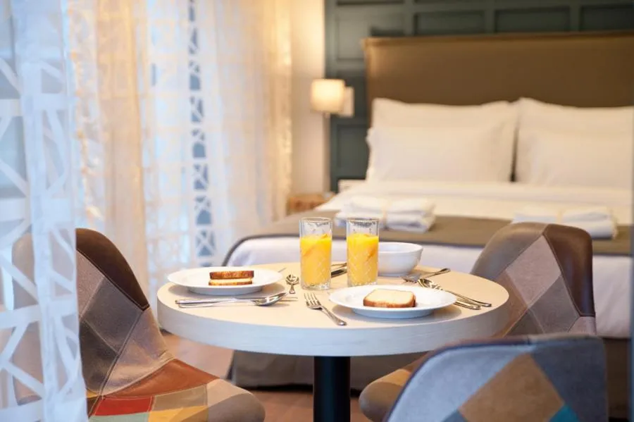 Bed in Athens Platinum Rooms and Suites