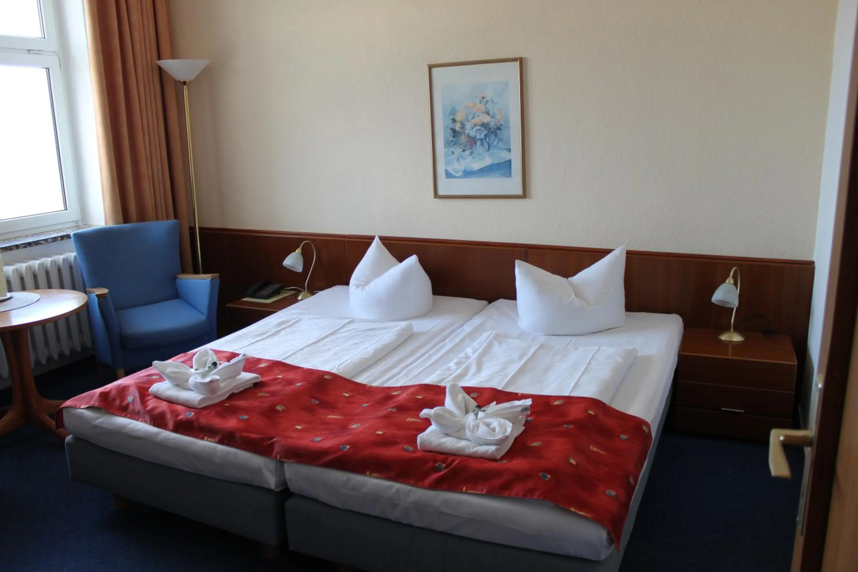 Photo of the whole room, Bed in Kur- und Ferienhotel Sanddorn
