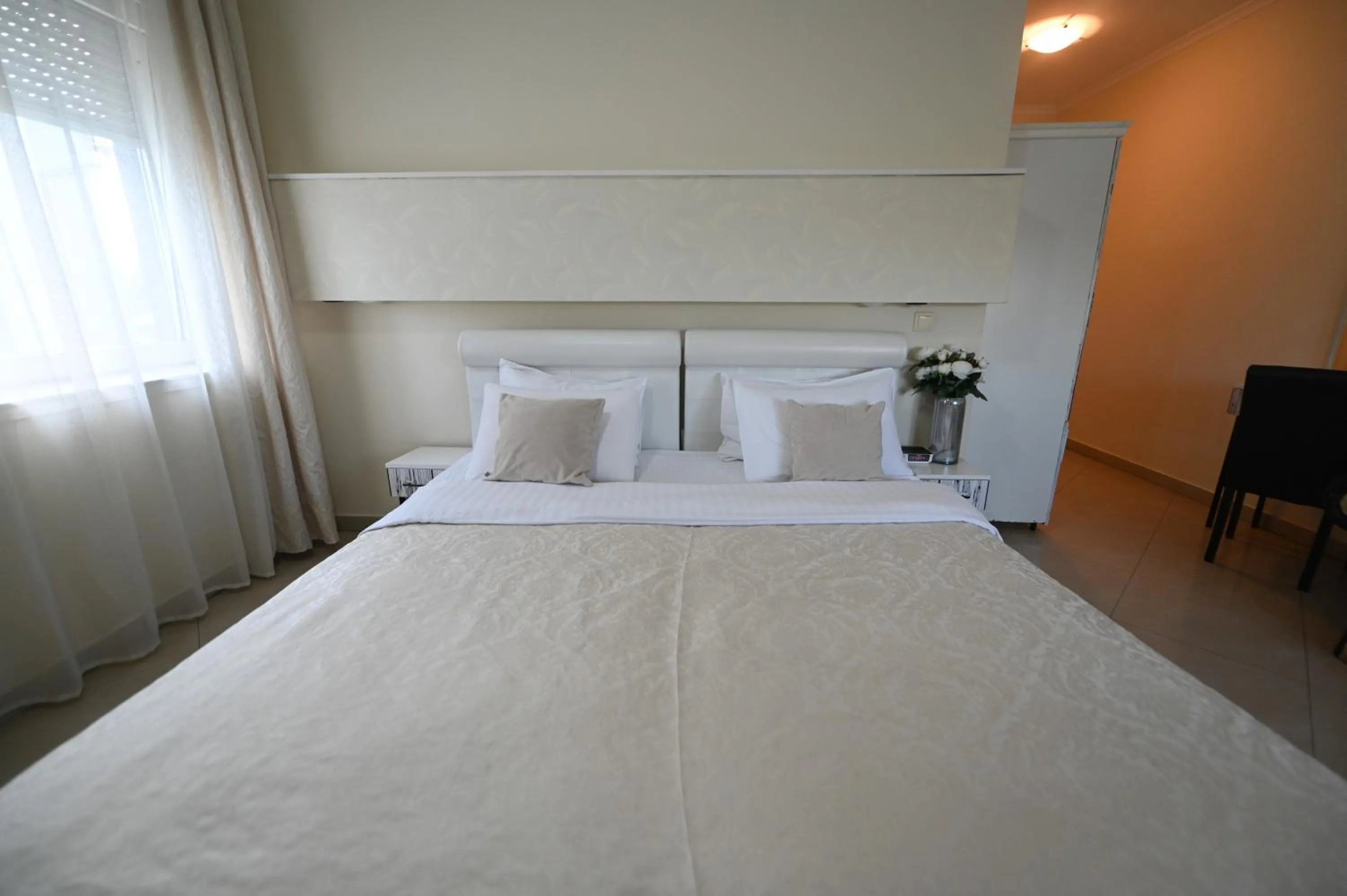 Bed in Garni Hotel Dash