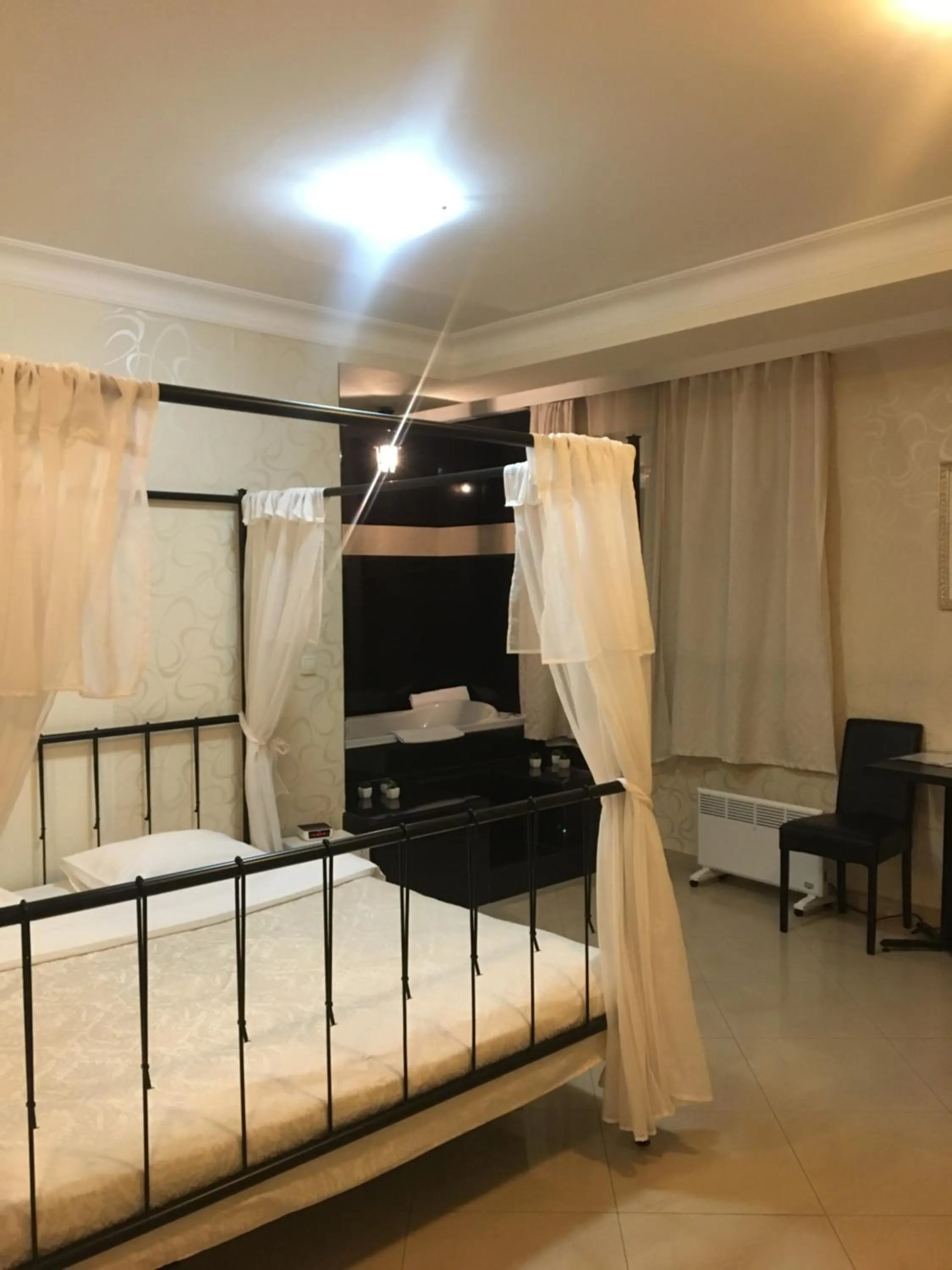 Bed in Garni Hotel Dash