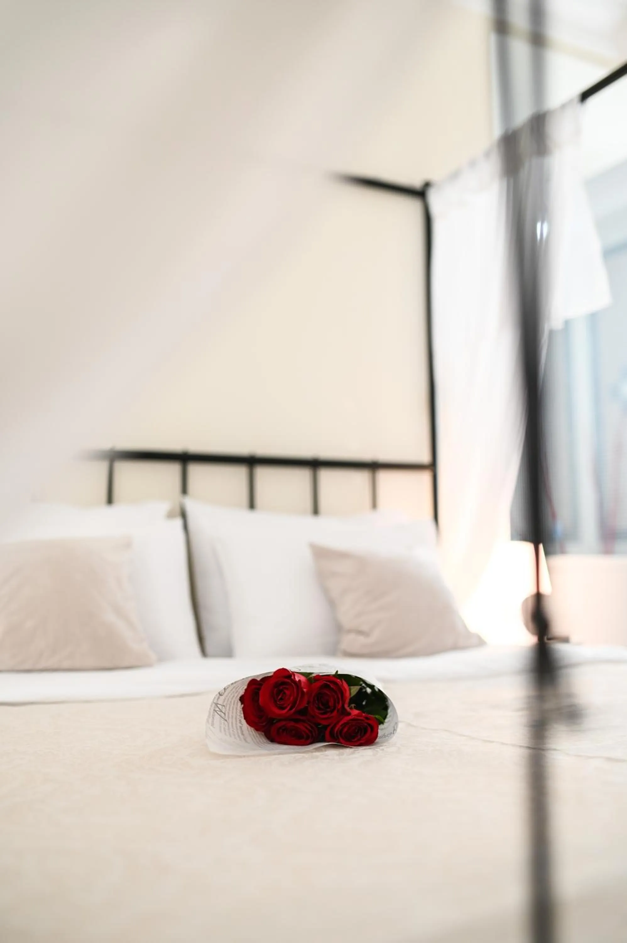 Bed in Garni Hotel Dash