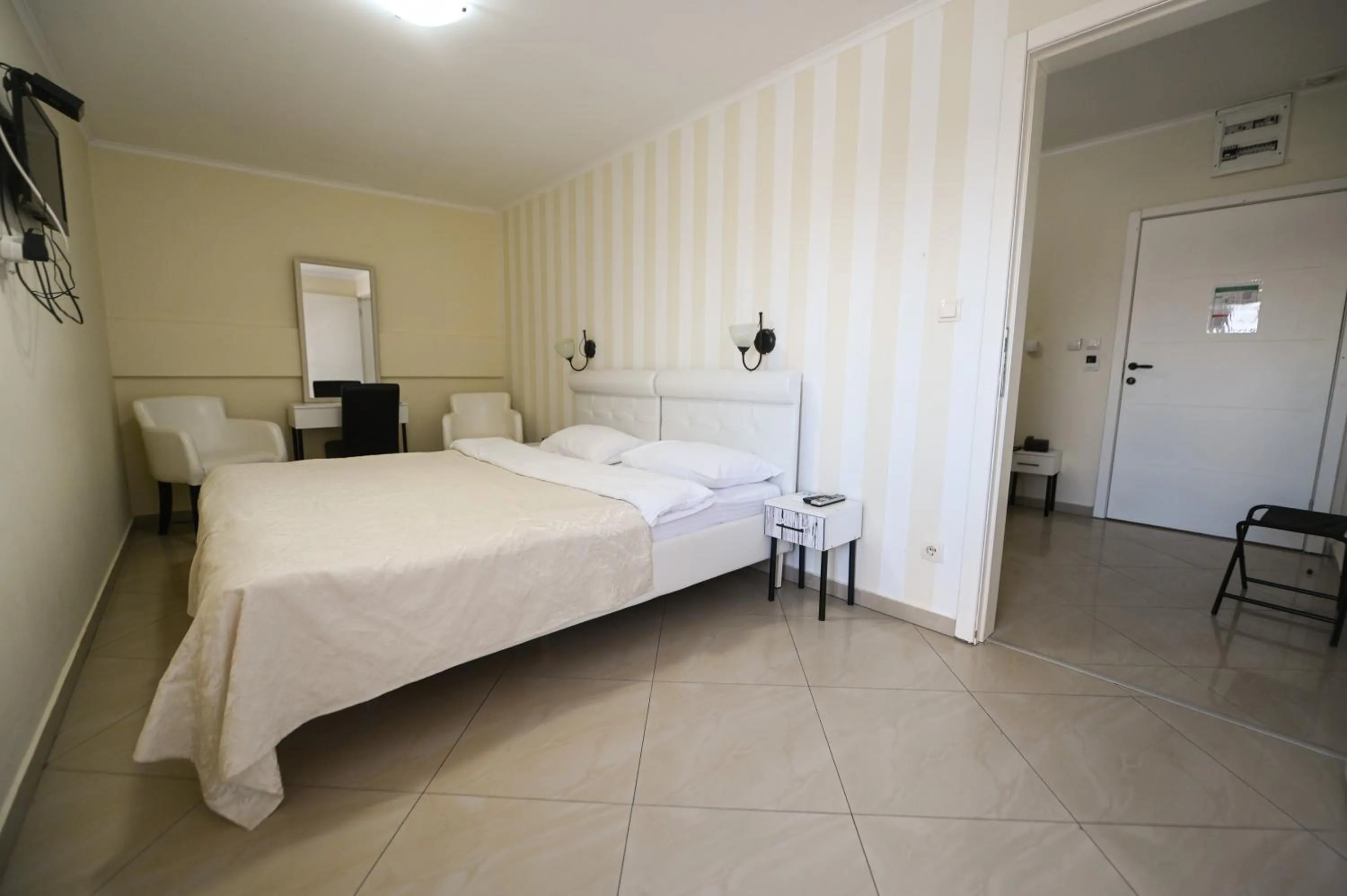 Photo of the whole room, Bed in Garni Hotel Dash