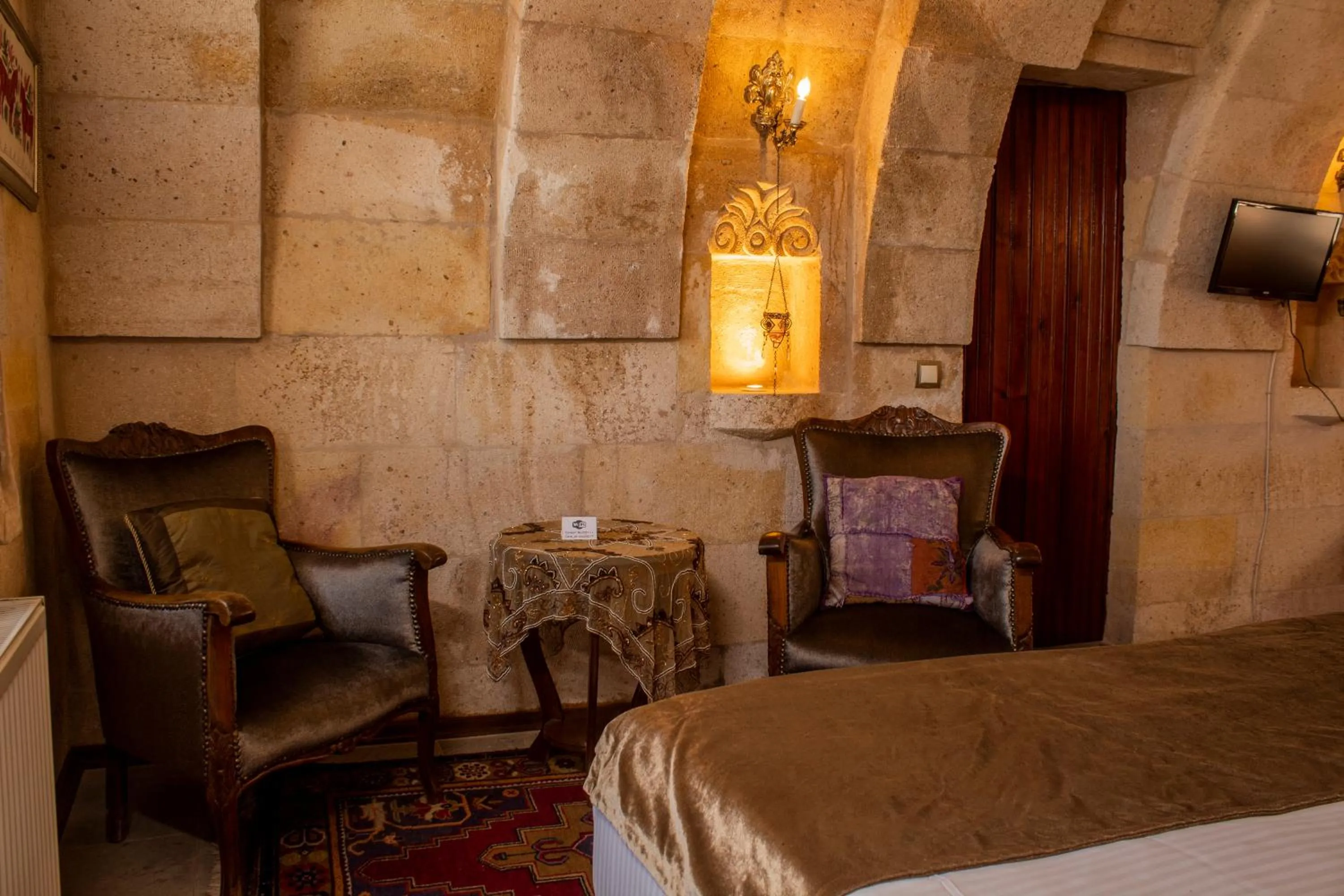 Seating area, Bed in Cave Art Hotel Cappadocia