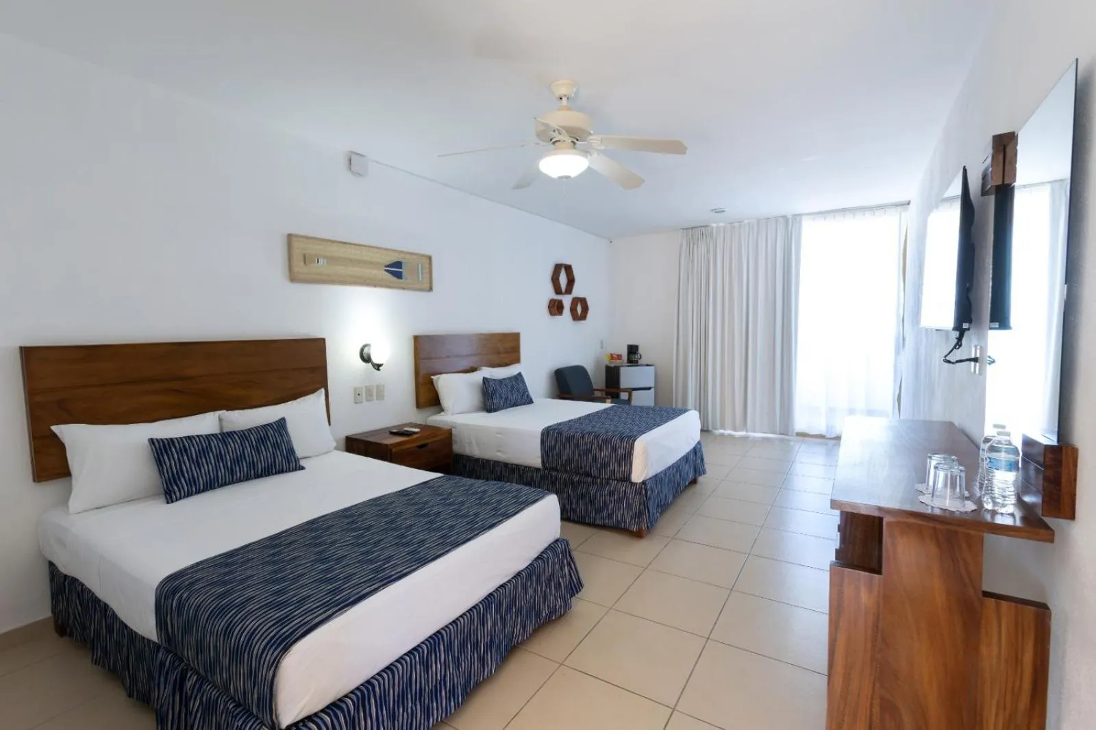 Bed in Costa Alegre Hotel & Suites