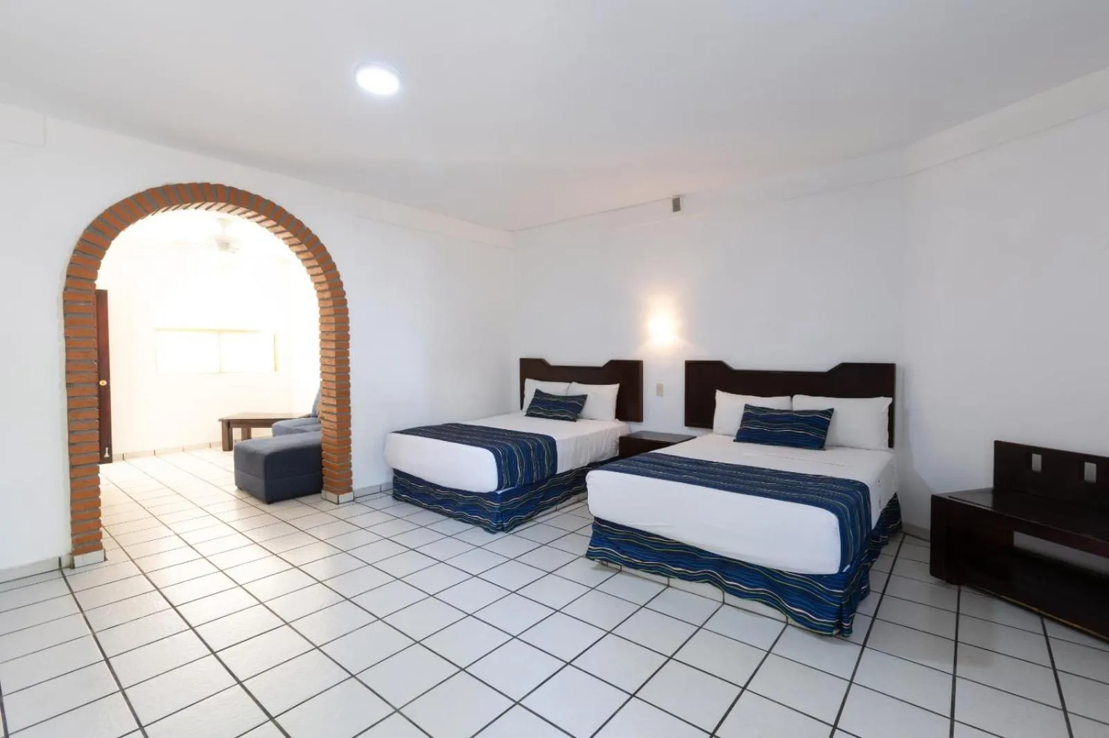 Bed in Costa Alegre Hotel & Suites