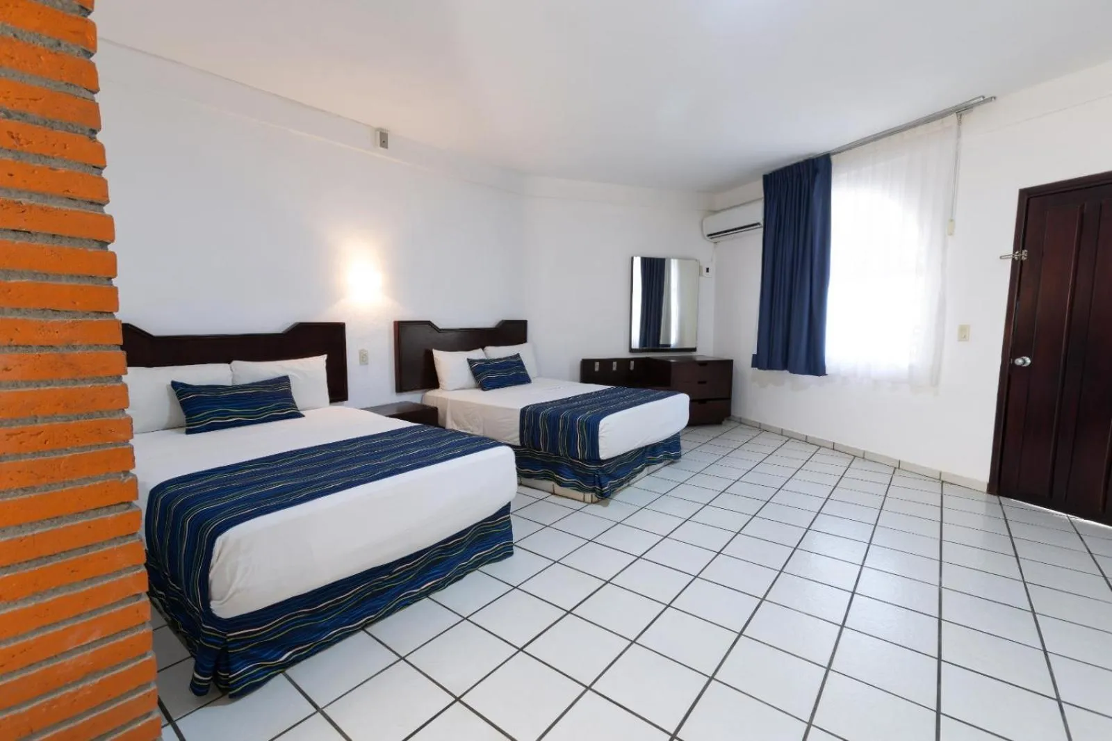 Bed in Costa Alegre Hotel & Suites