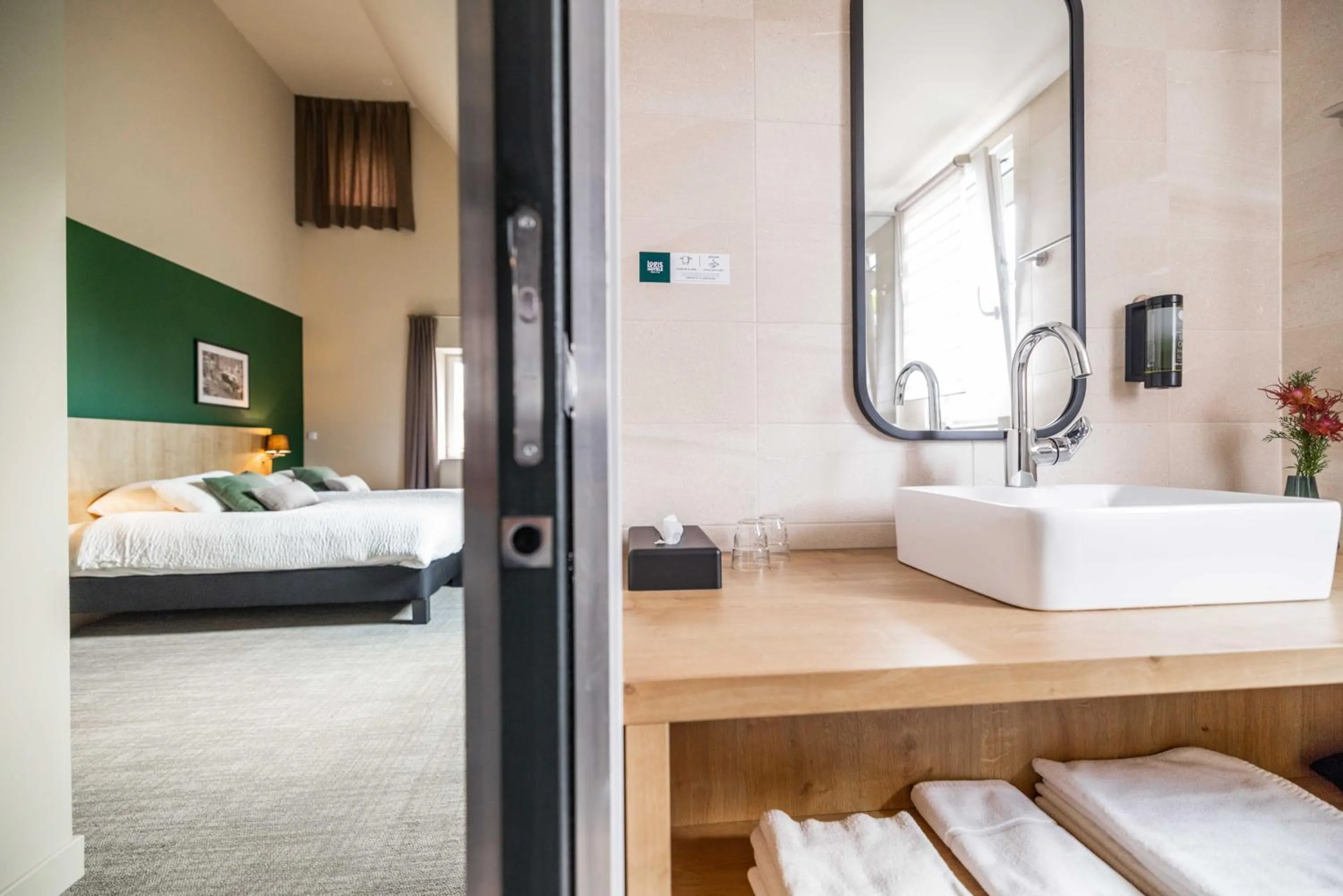 Bed in Logis Hôtel Restaurant & Spa La Rochette