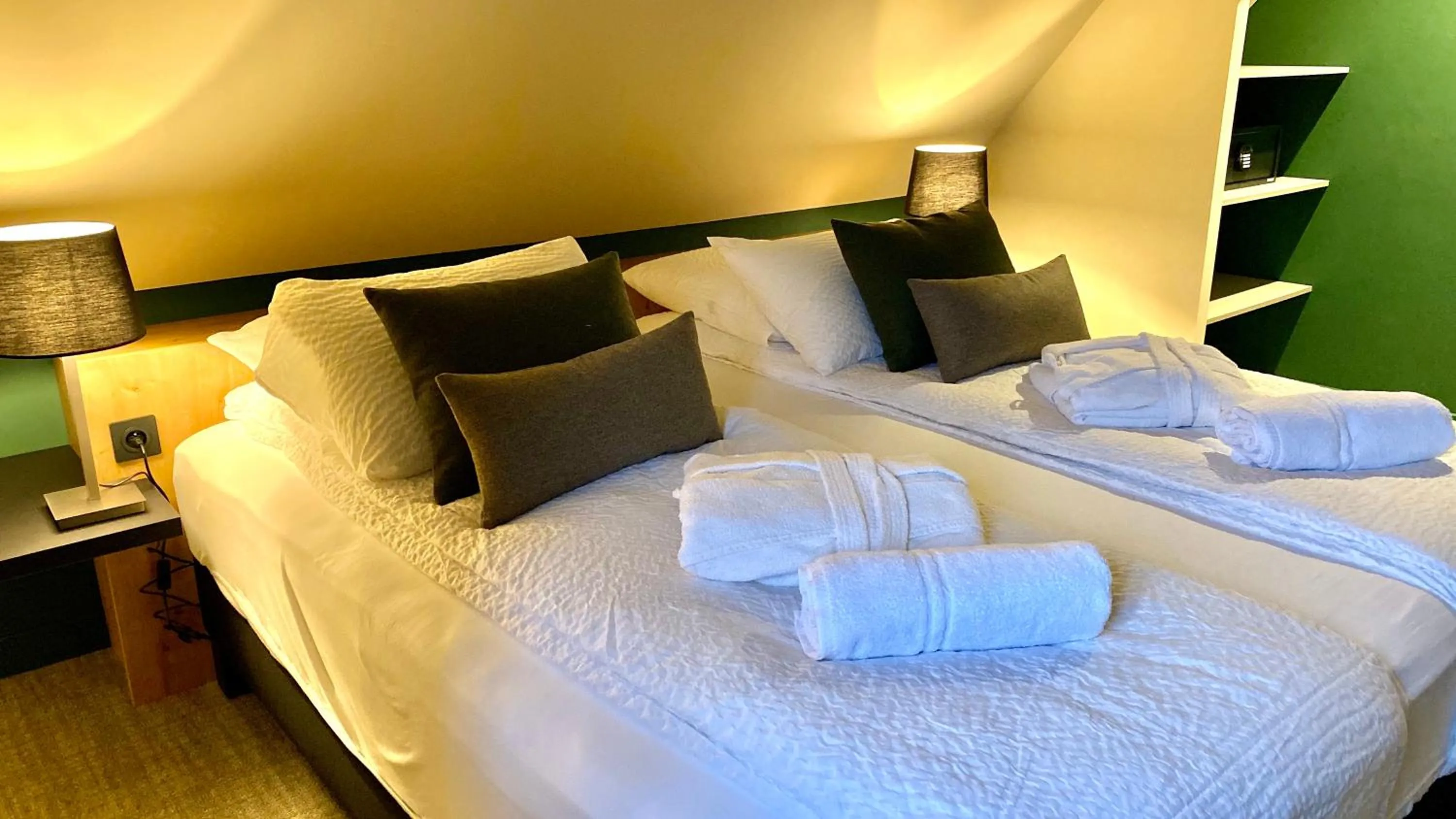 Bed in Logis Hôtel Restaurant & Spa La Rochette