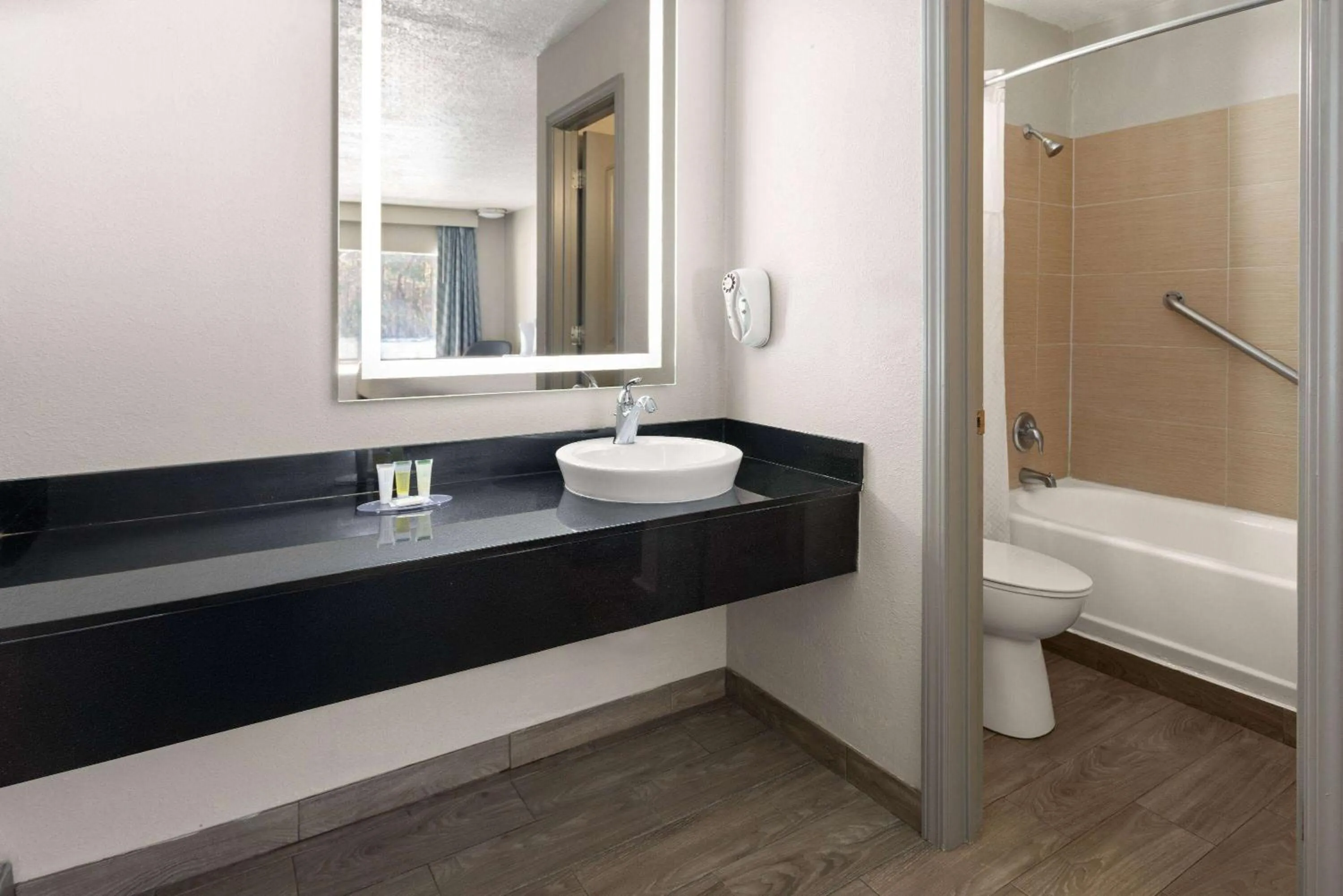 Bathroom in Days Inn by Wyndham Hardeeville Near Hilton Head